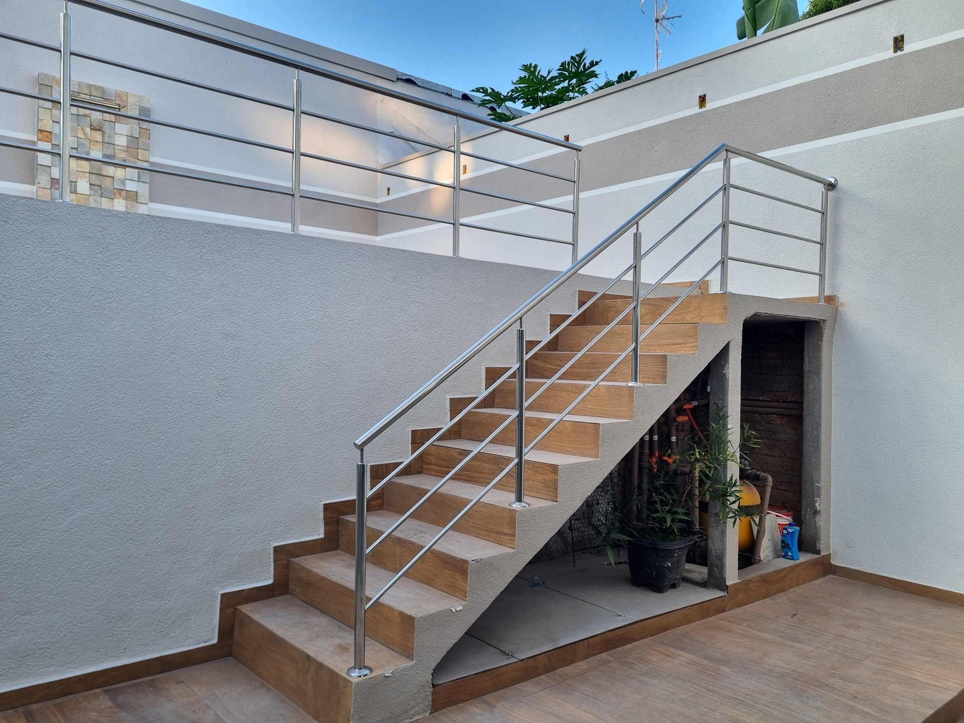 woman wearing yellow long-sleeved dress under white clouds and blue sky during daytime