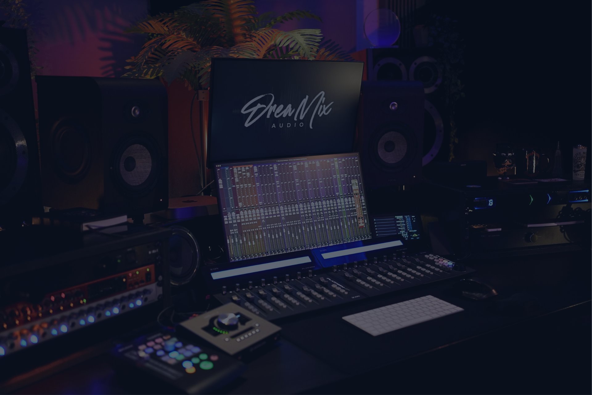 a laptop computer sitting on top of a desk