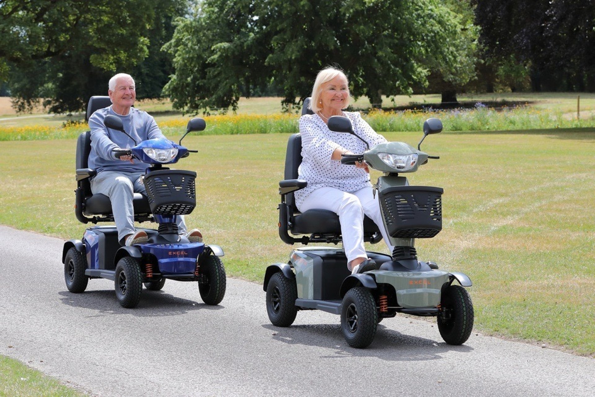 a man sitting on a bench with two children