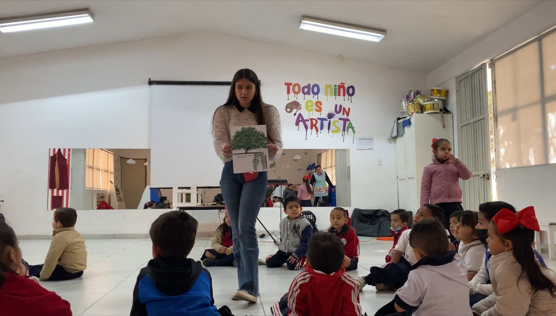 woman wearing yellow long-sleeved dress under white clouds and blue sky during daytime