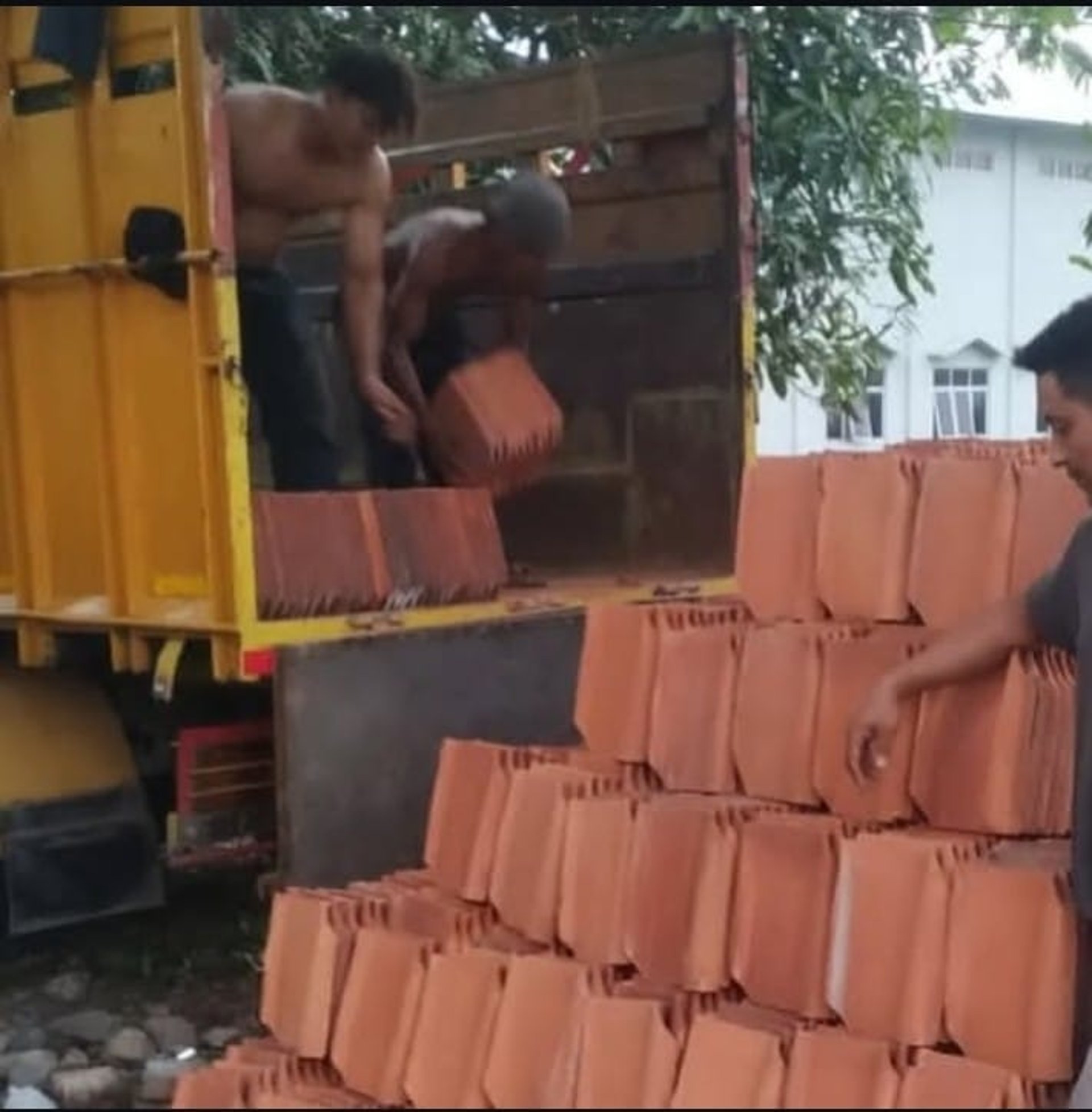 person wearing grey knit sweater