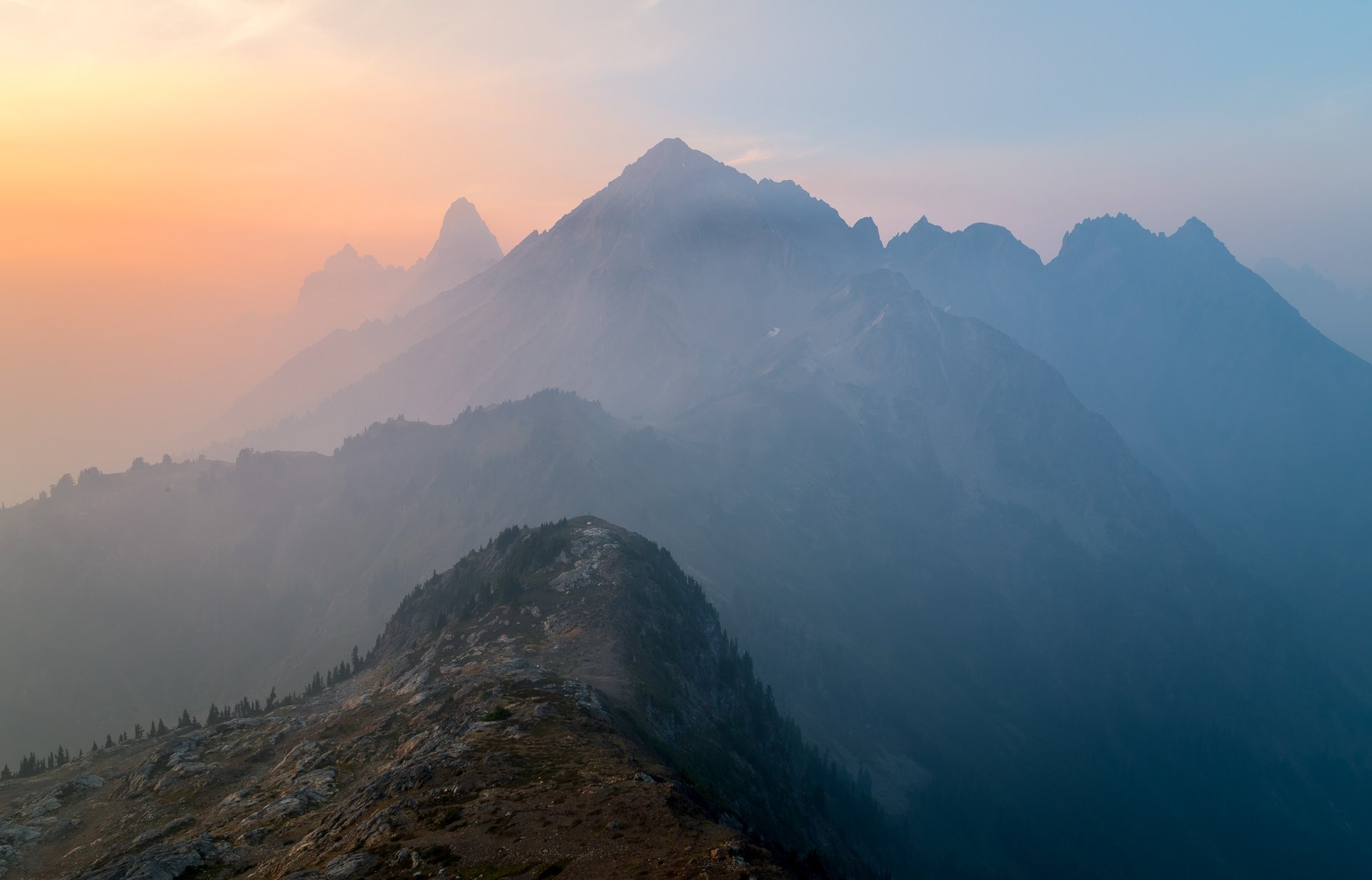 mountain range under blue sky