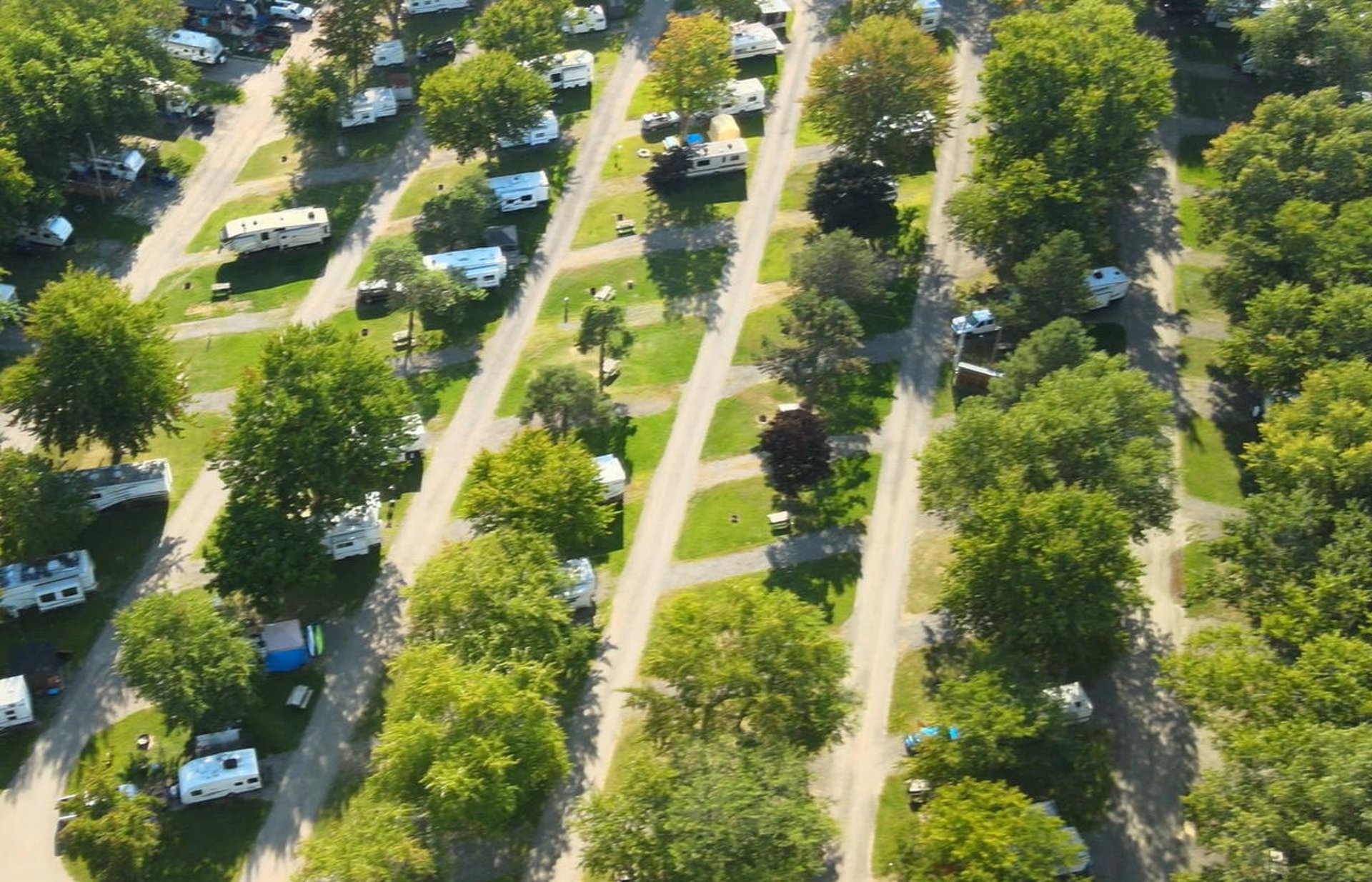 grayscale photography of vintage vehicle on road