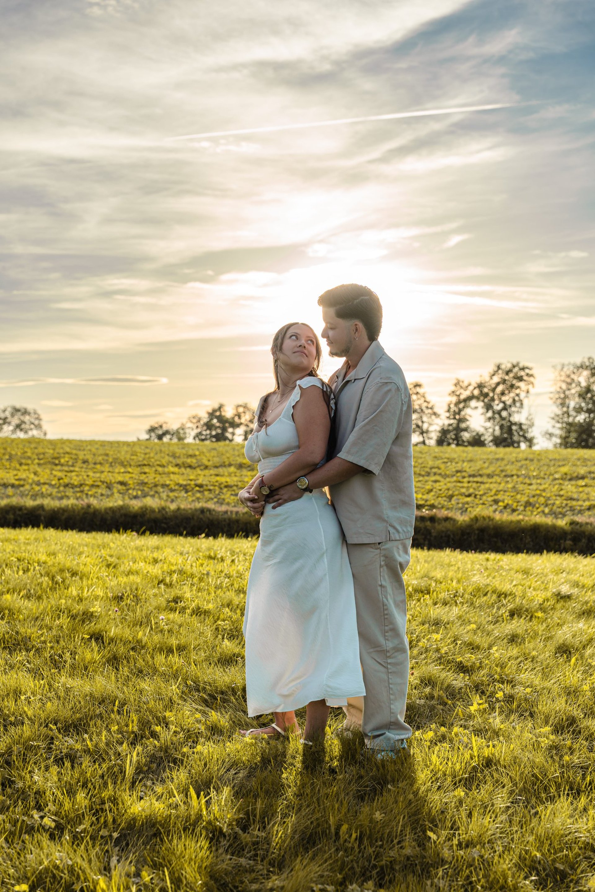 couple wearing silver-colored rings