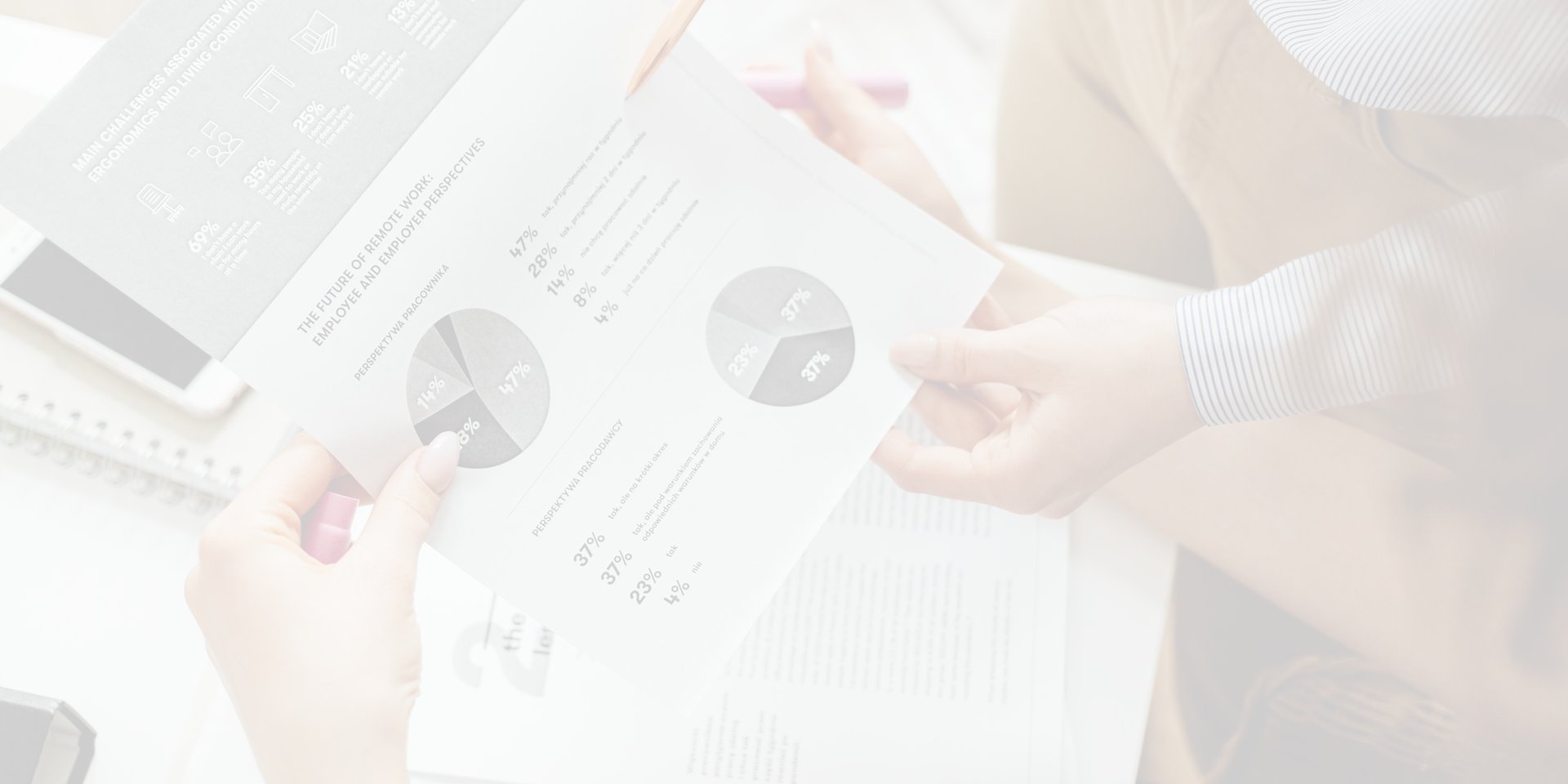 an abstract photo of a curved building with a blue sky in the background