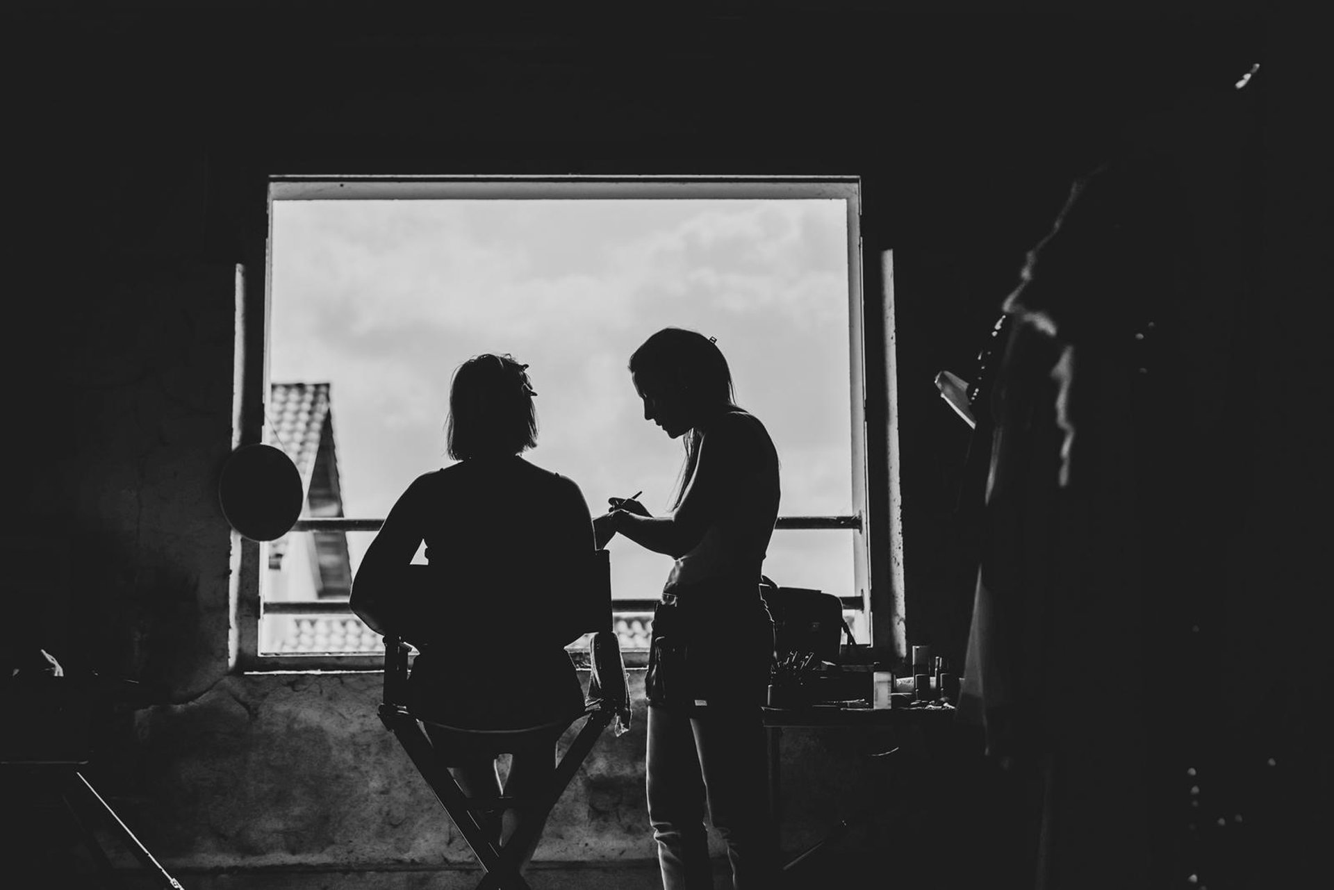an abstract photo of a curved building with a blue sky in the background