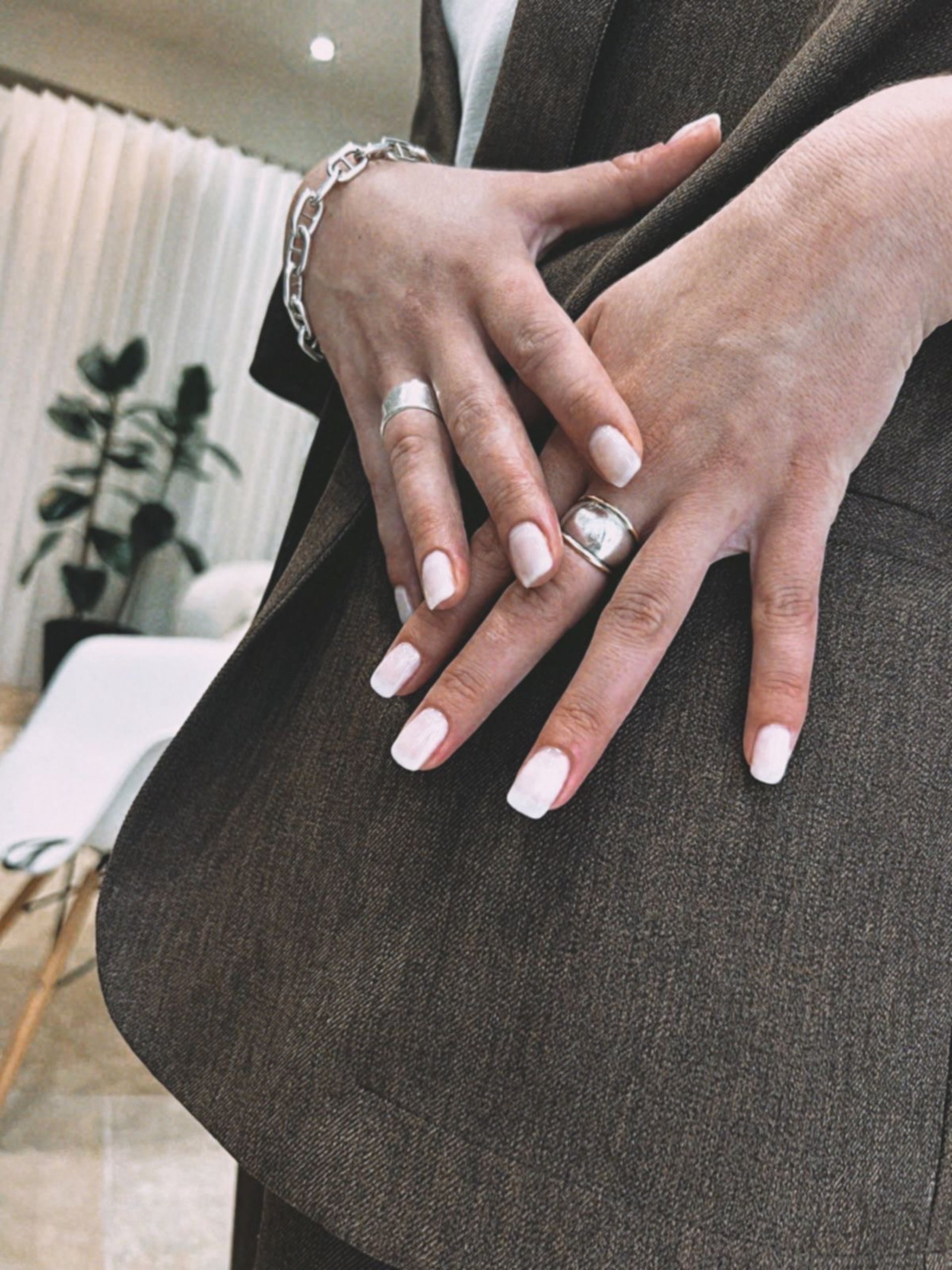 an abstract photo of a curved building with a blue sky in the background