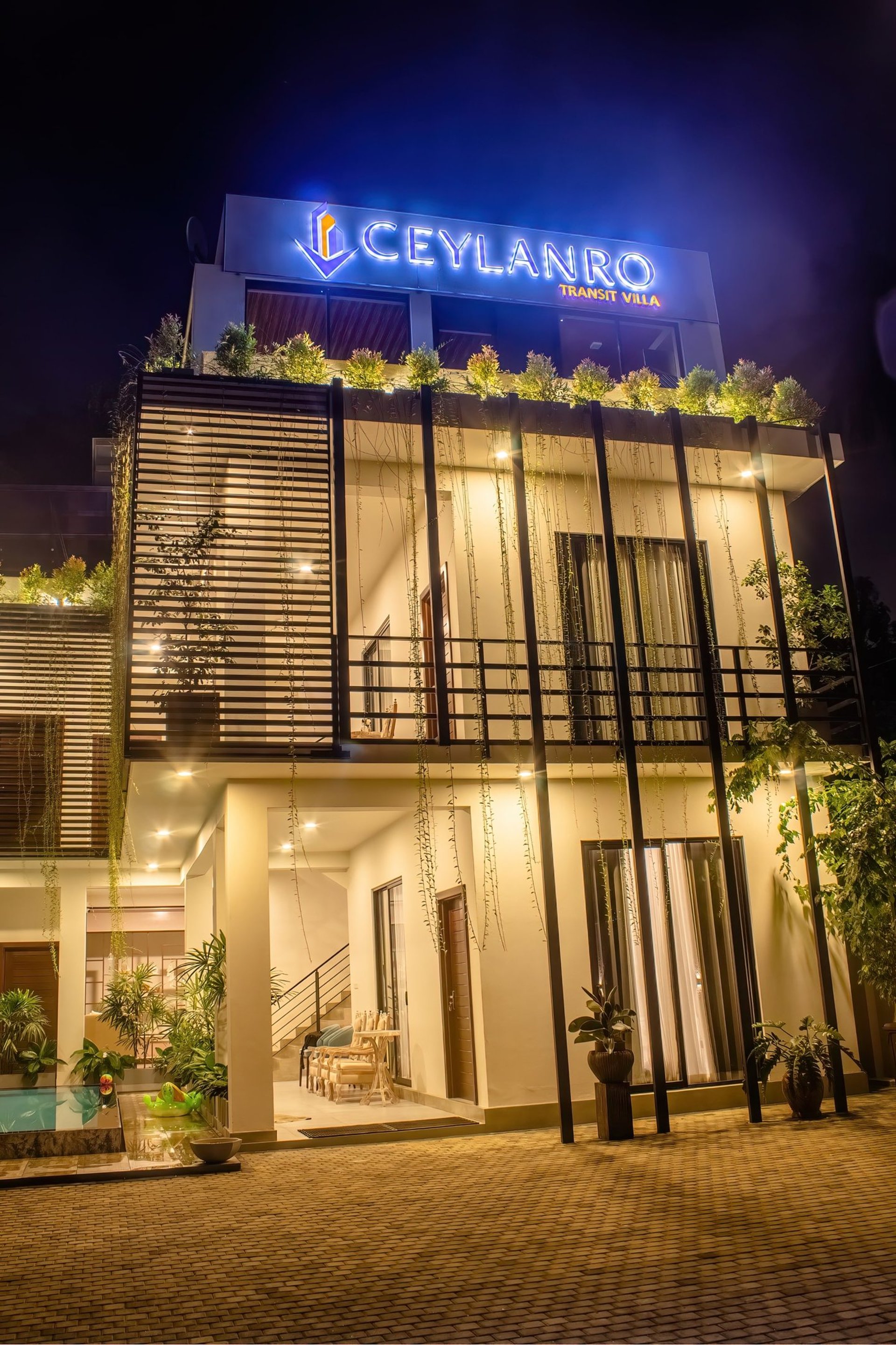an abstract photo of a curved building with a blue sky in the background