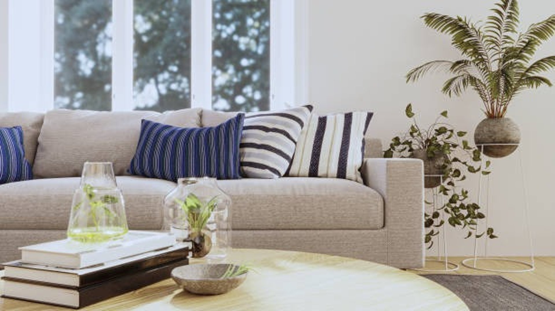 a living room filled with furniture and a large window