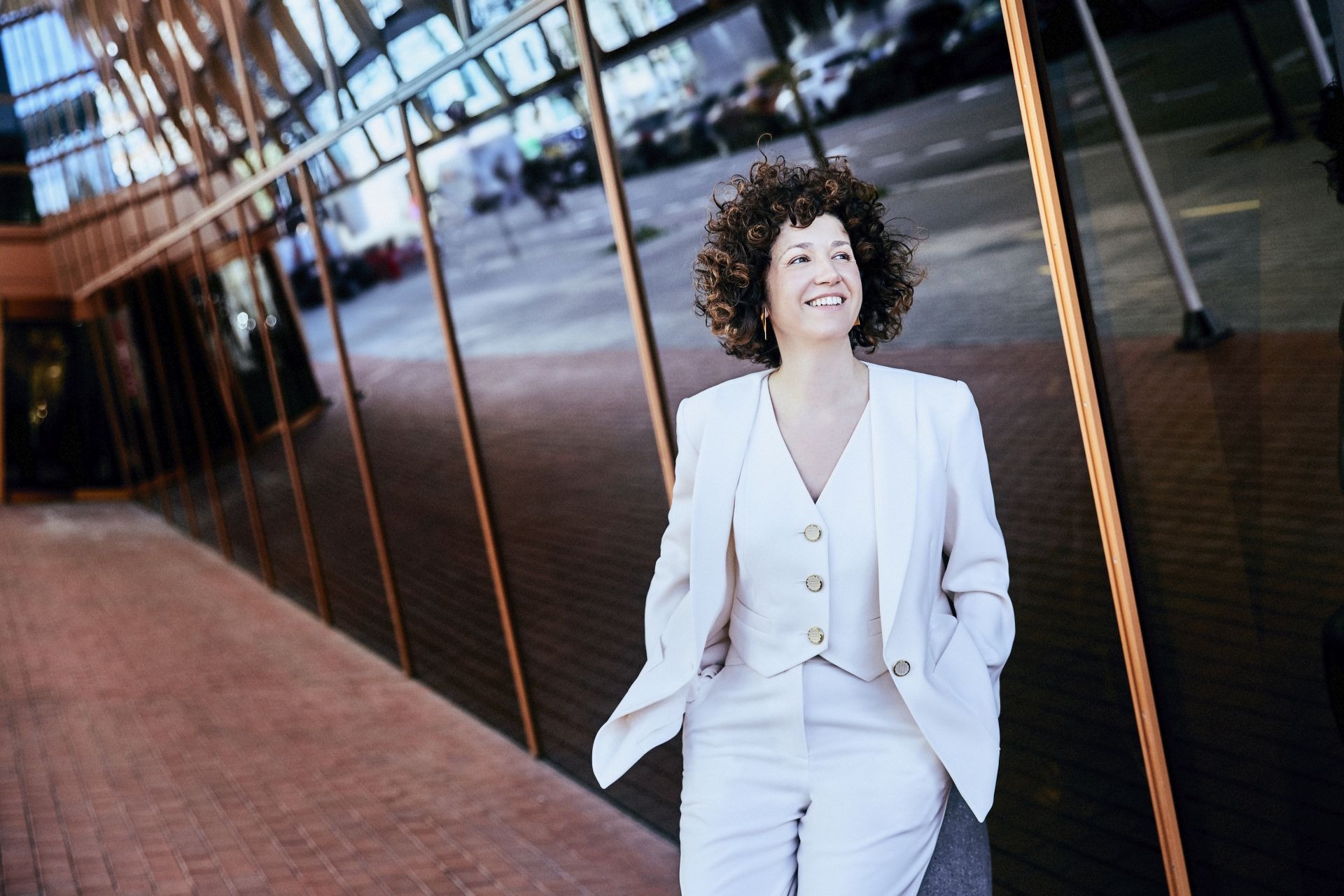 A white sculpture is shown against a white background