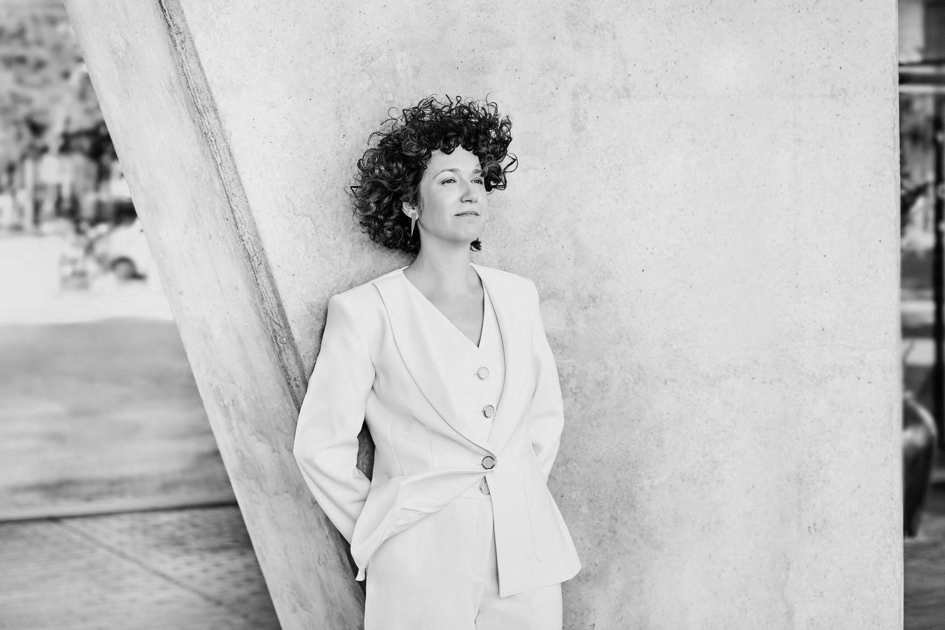 A white sculpture is shown against a white background