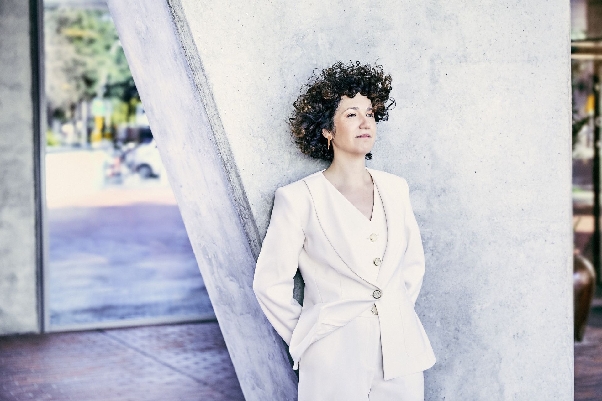 A white sculpture is shown against a white background