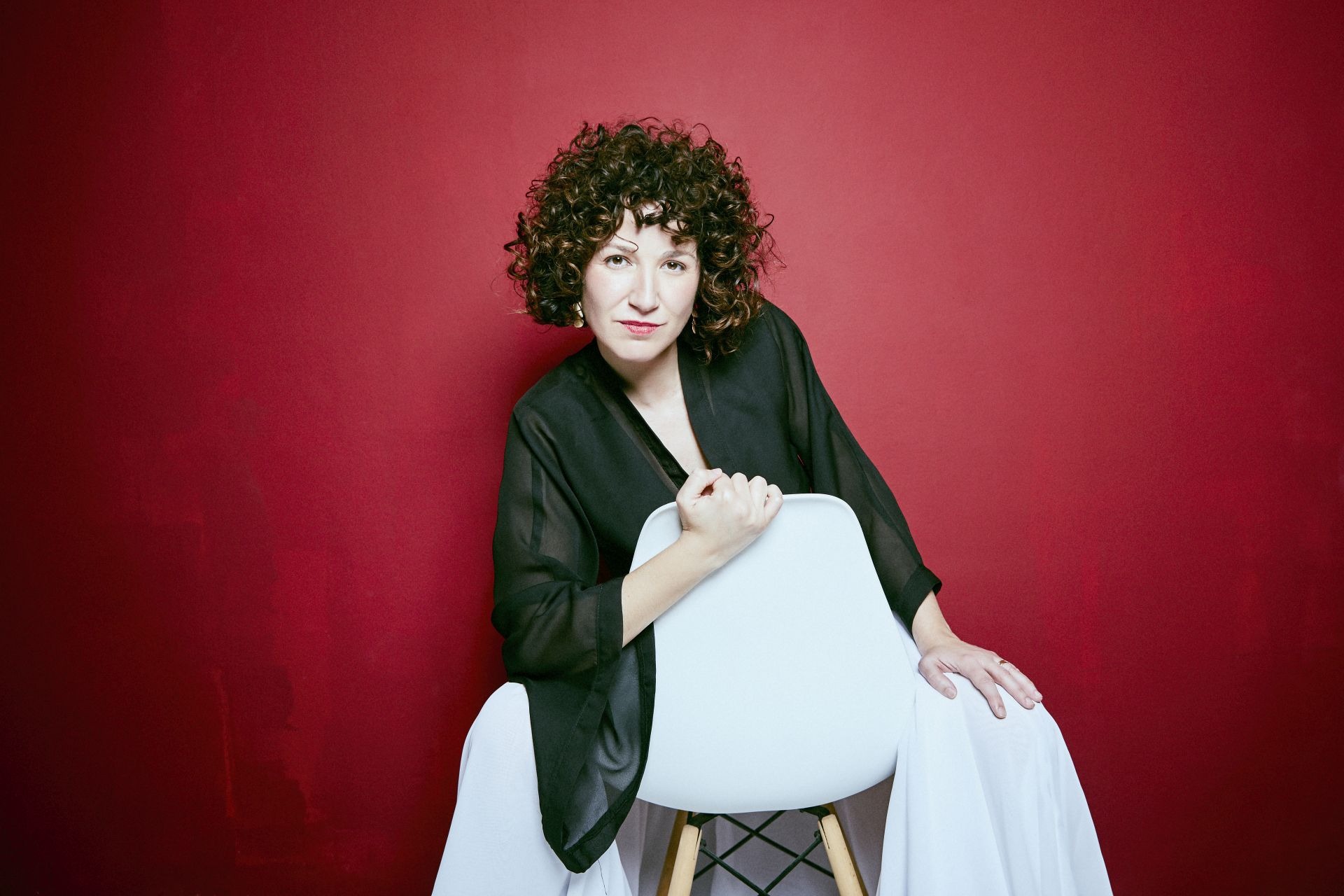 Orchestra and choir performing on stage