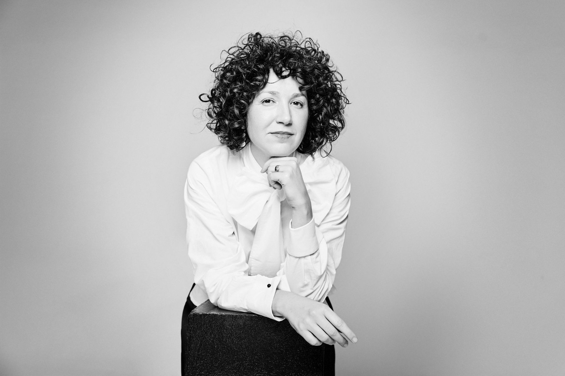 A white sculpture is shown against a white background