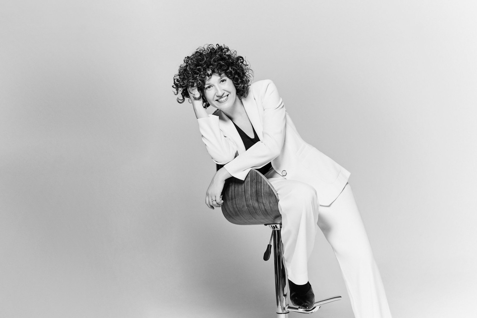 A white sculpture is shown against a white background