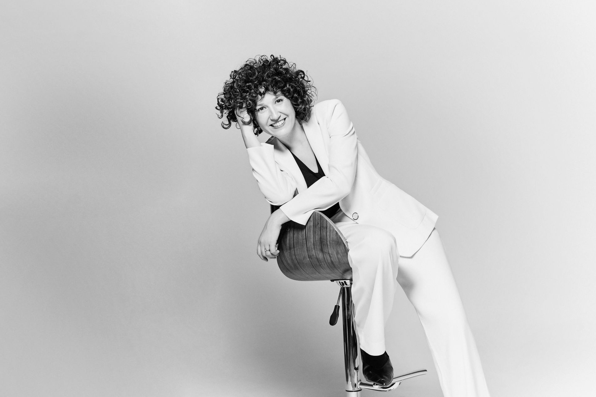 A white sculpture is shown against a white background