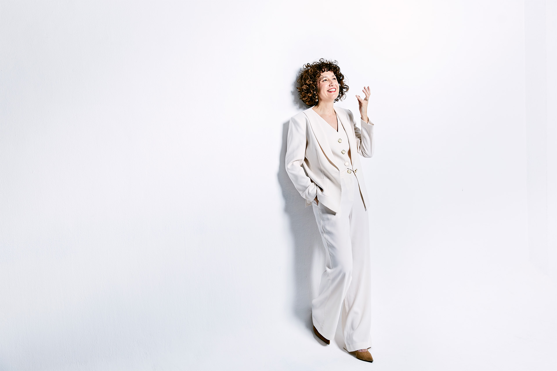 A white sculpture is shown against a white background