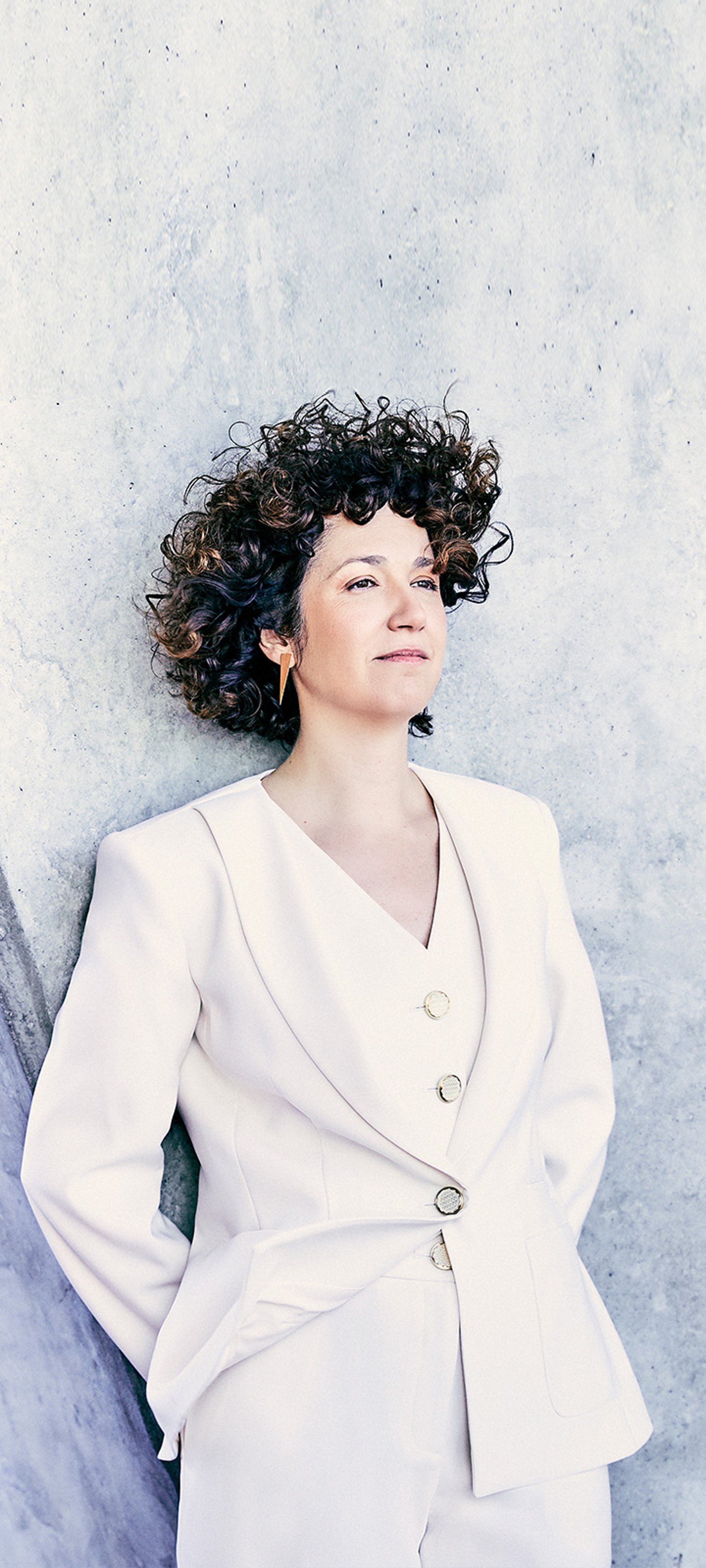 A white sculpture is shown against a white background