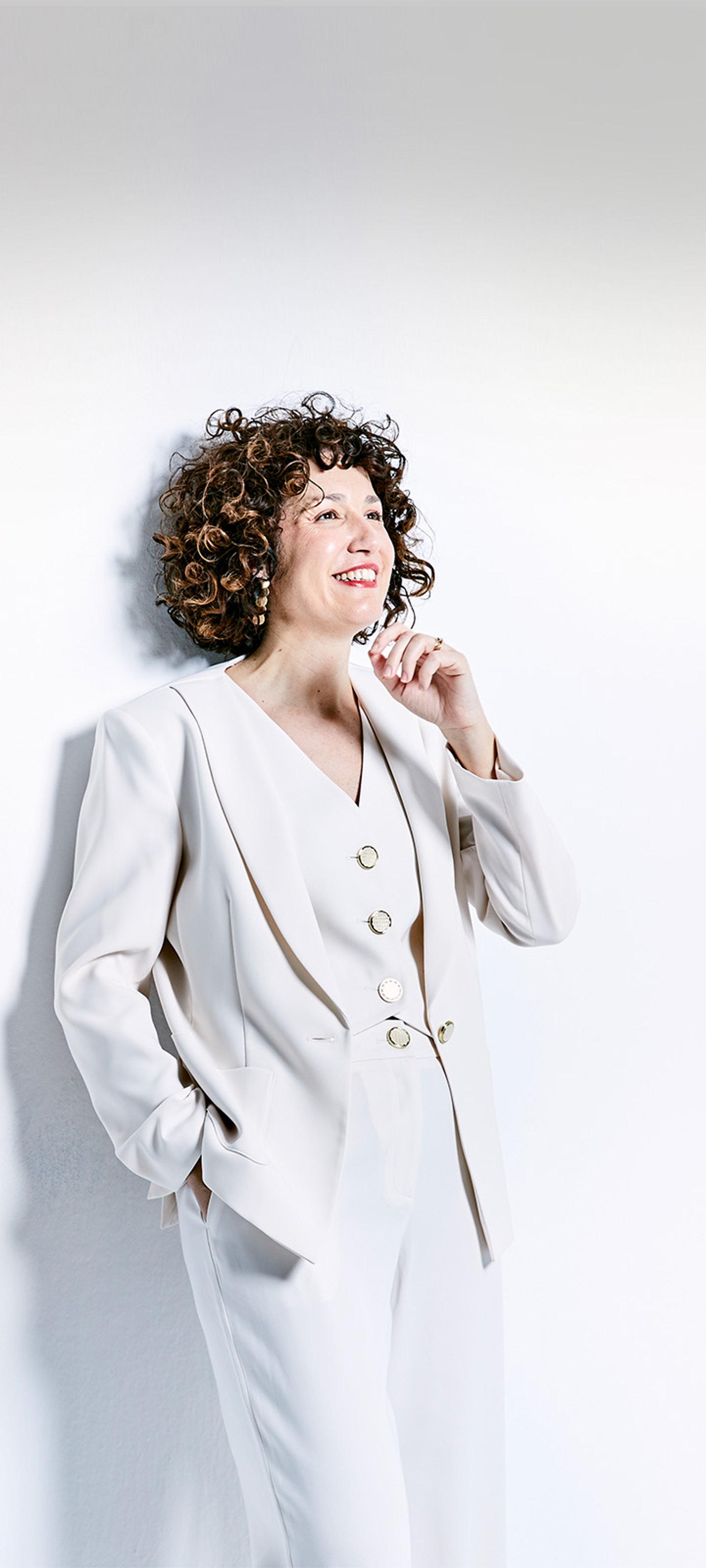 A white sculpture is shown against a white background