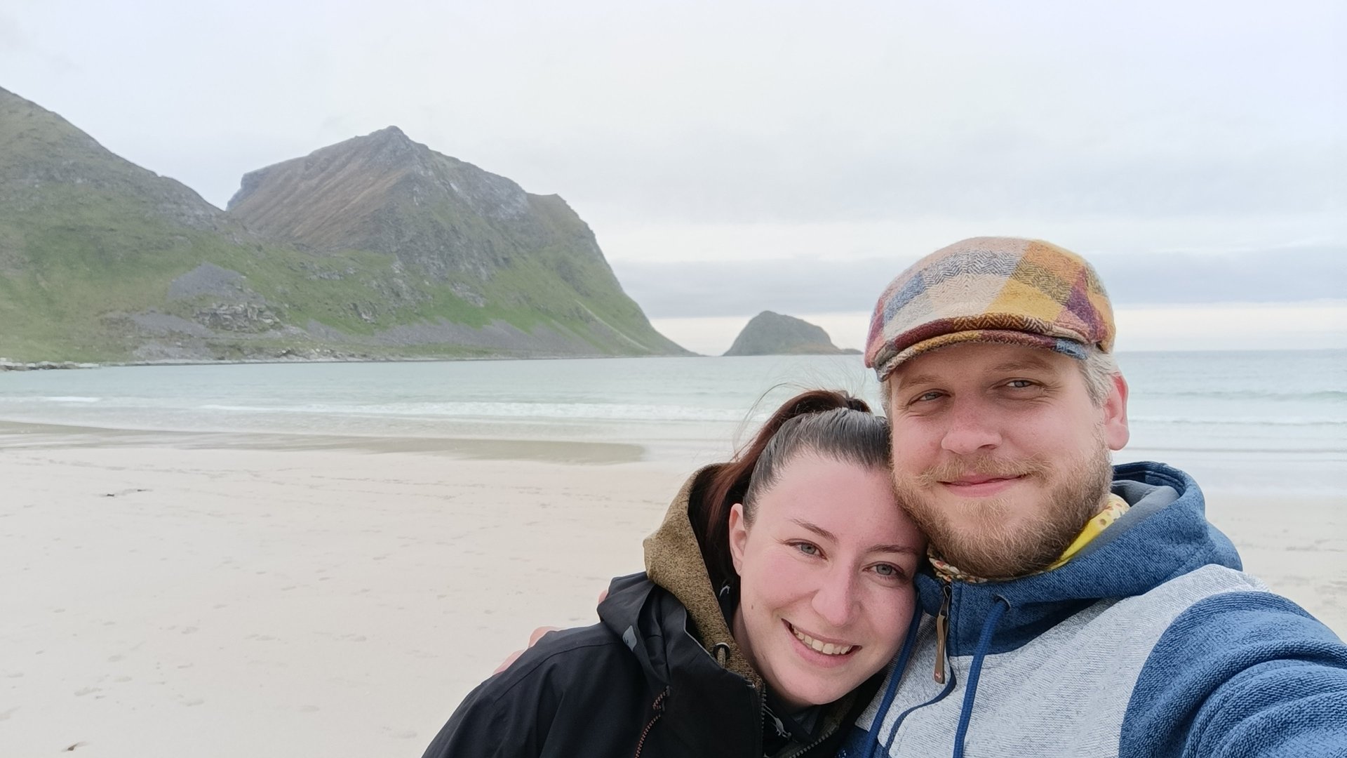 couple wearing silver-colored rings