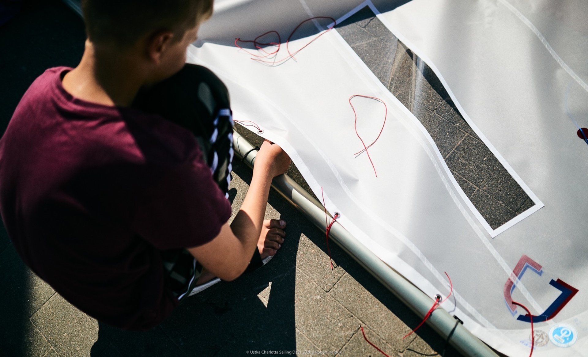 an abstract photo of a curved building with a blue sky in the background