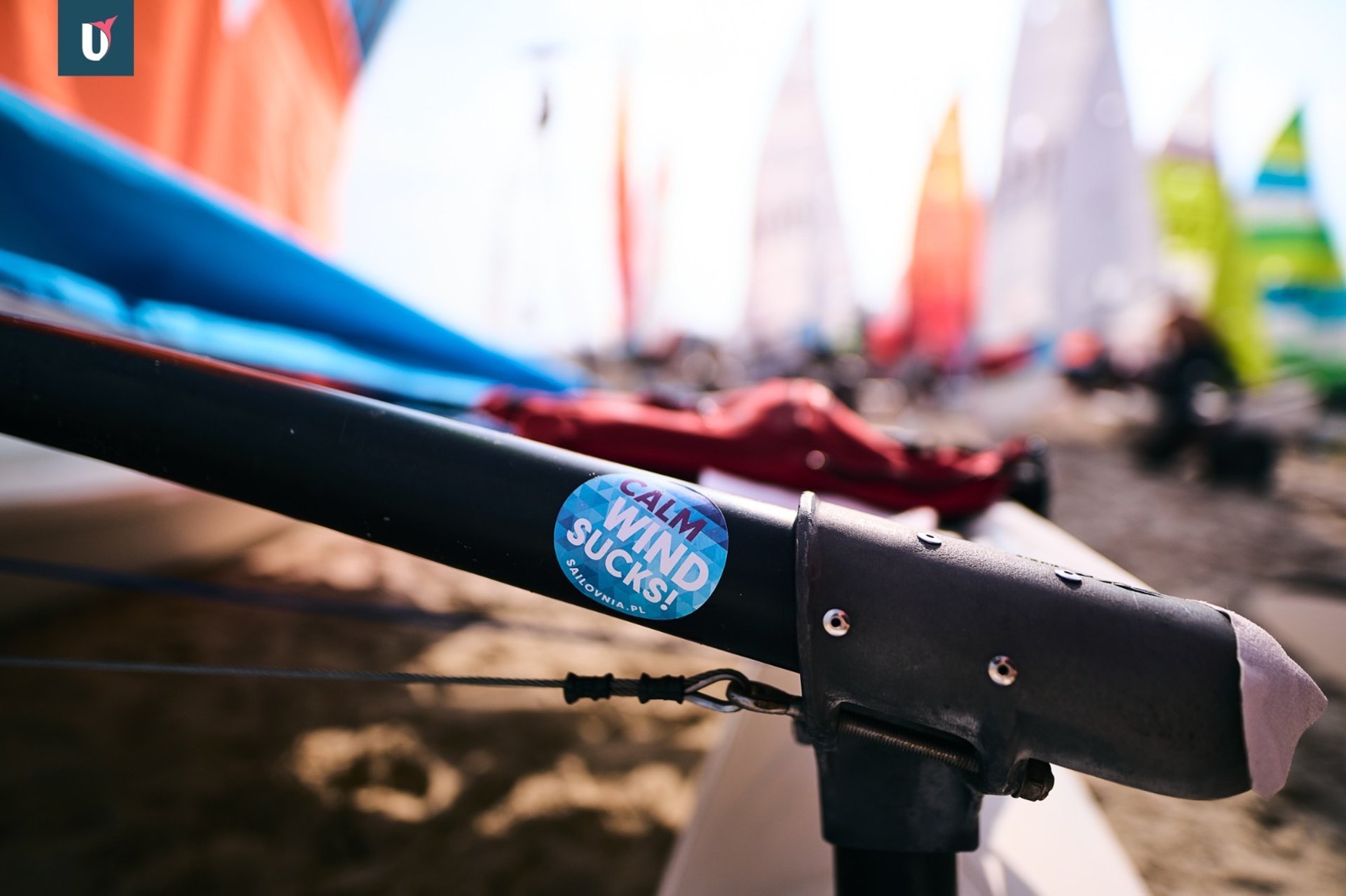 an abstract photo of a curved building with a blue sky in the background