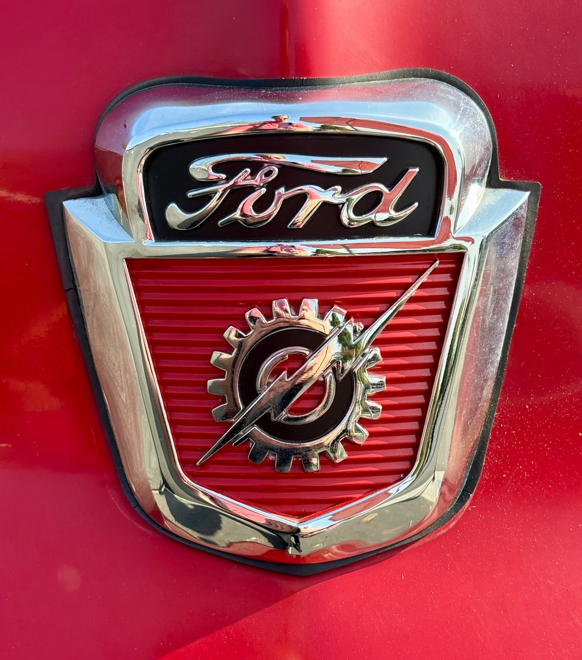 an abstract photo of a curved building with a blue sky in the background