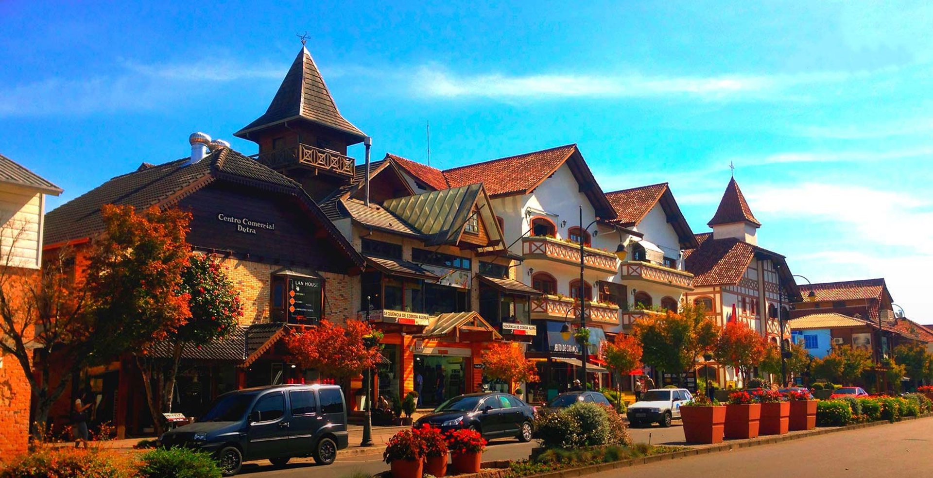 an abstract photo of a curved building with a blue sky in the background