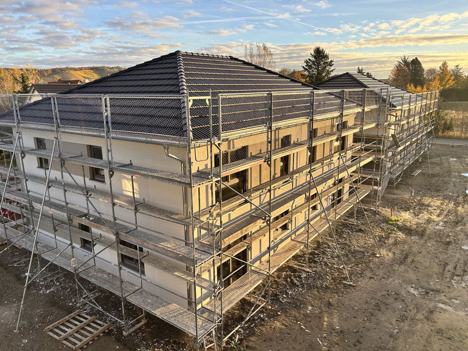 black and brown leather padded tub sofa