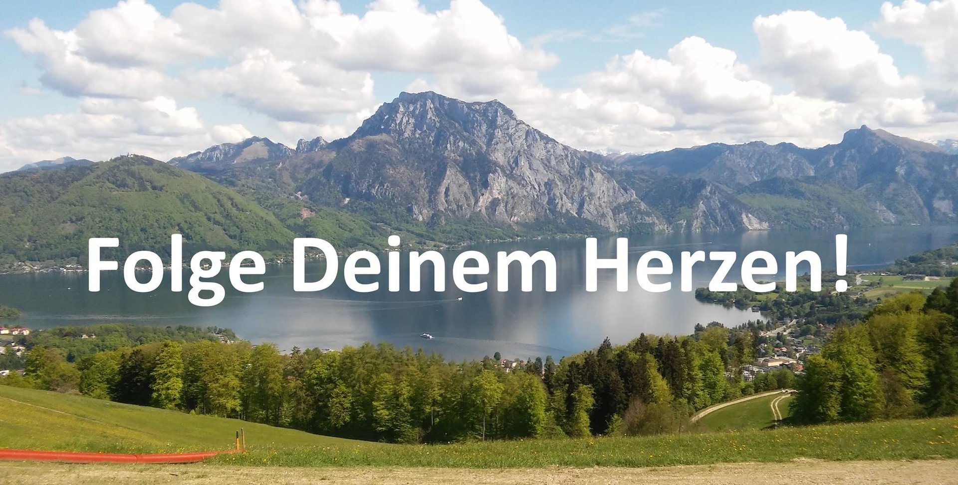 woman wearing yellow long-sleeved dress under white clouds and blue sky during daytime