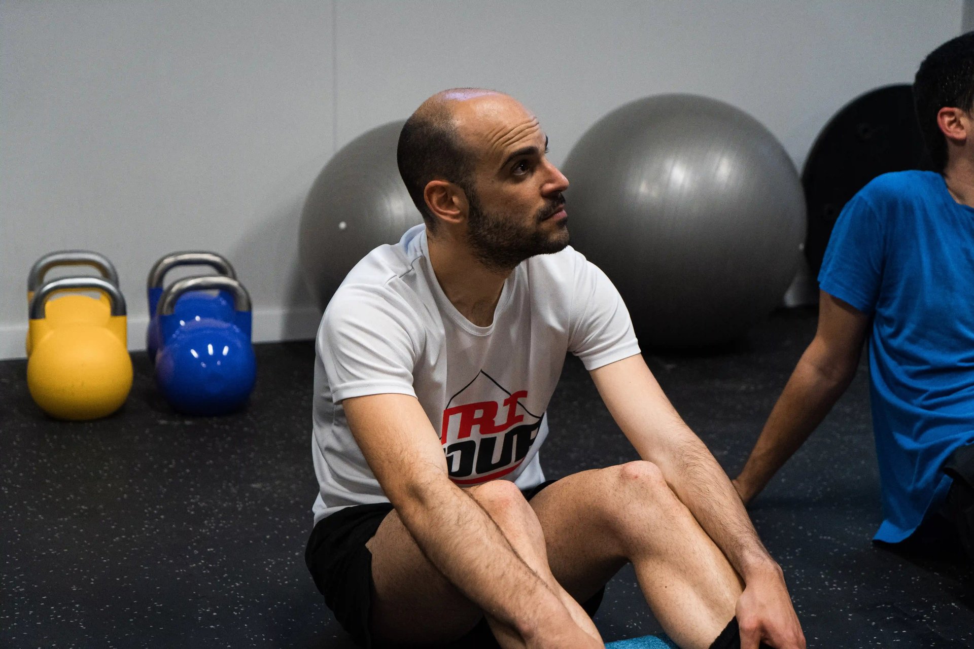 an abstract photo of a curved building with a blue sky in the background