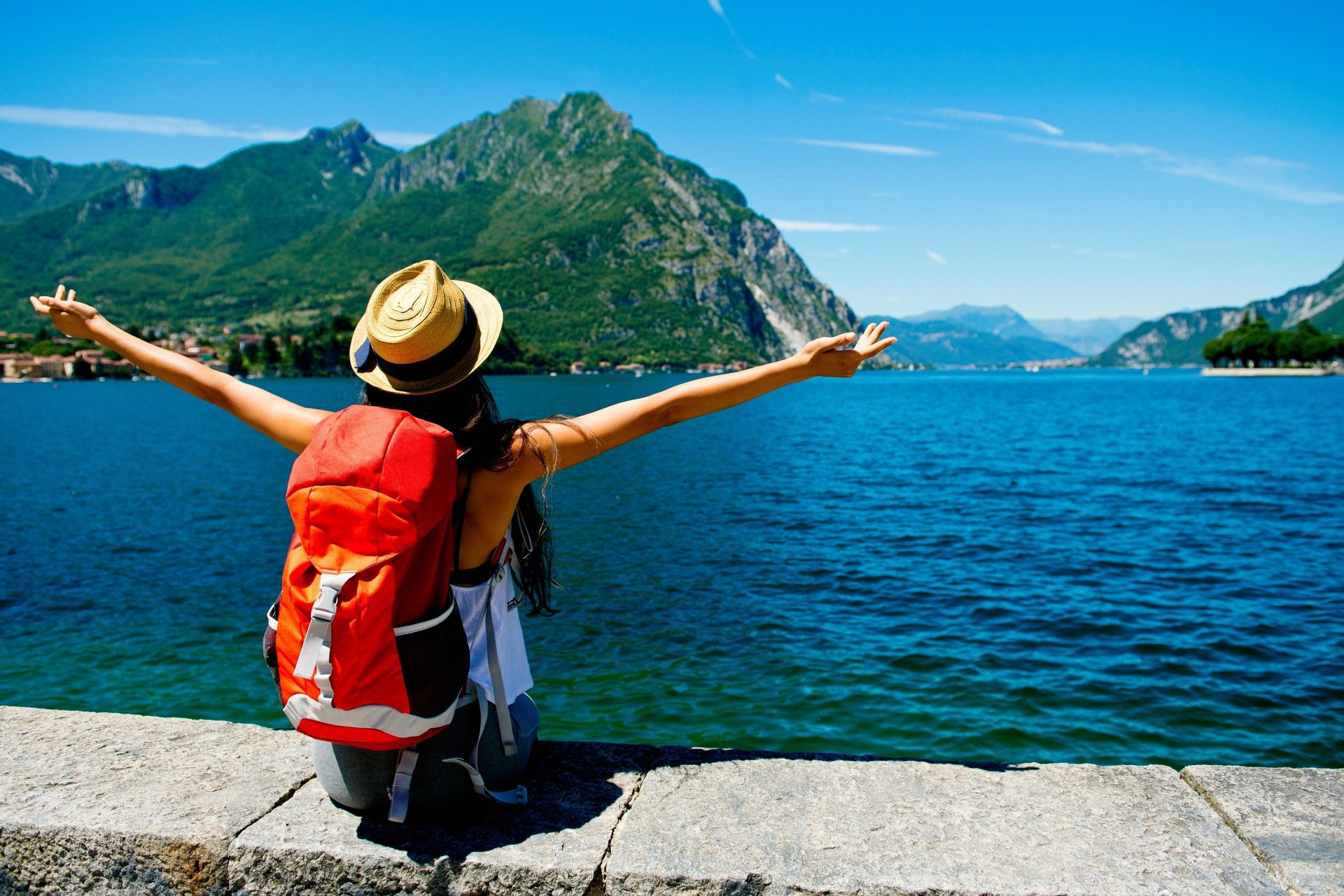 black and white speakers on white shelf