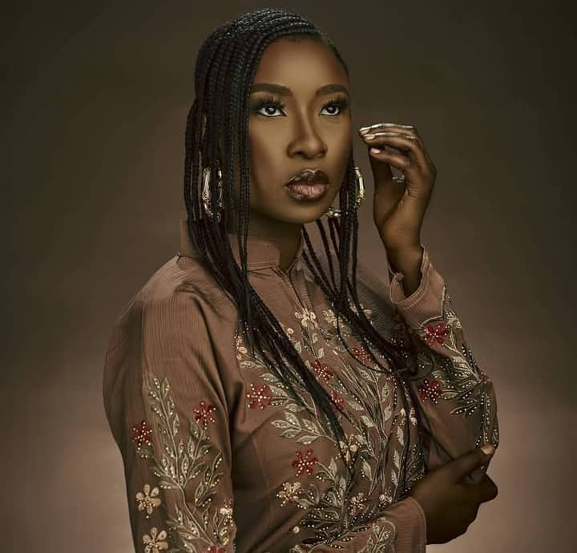 an abstract photo of a curved building with a blue sky in the background