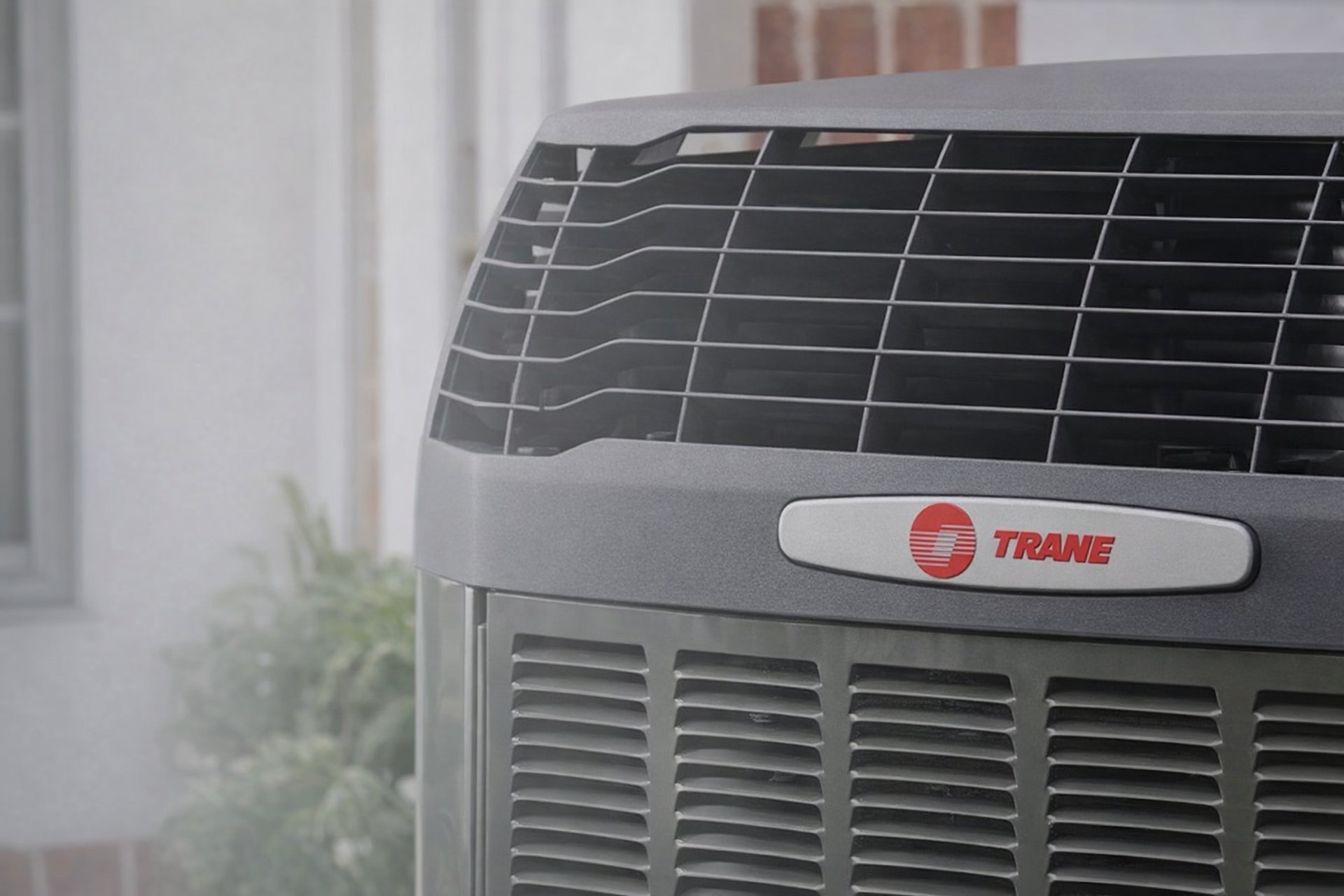 black and brown leather padded tub sofa