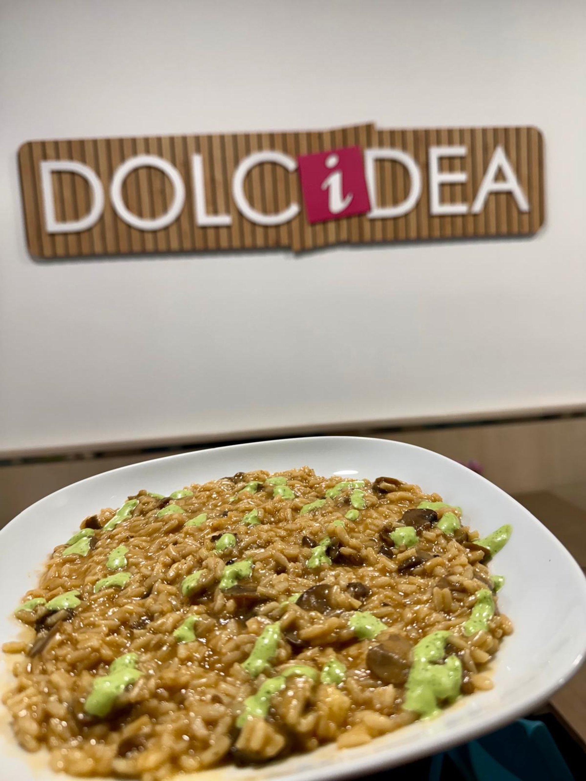 woman wearing yellow long-sleeved dress under white clouds and blue sky during daytime