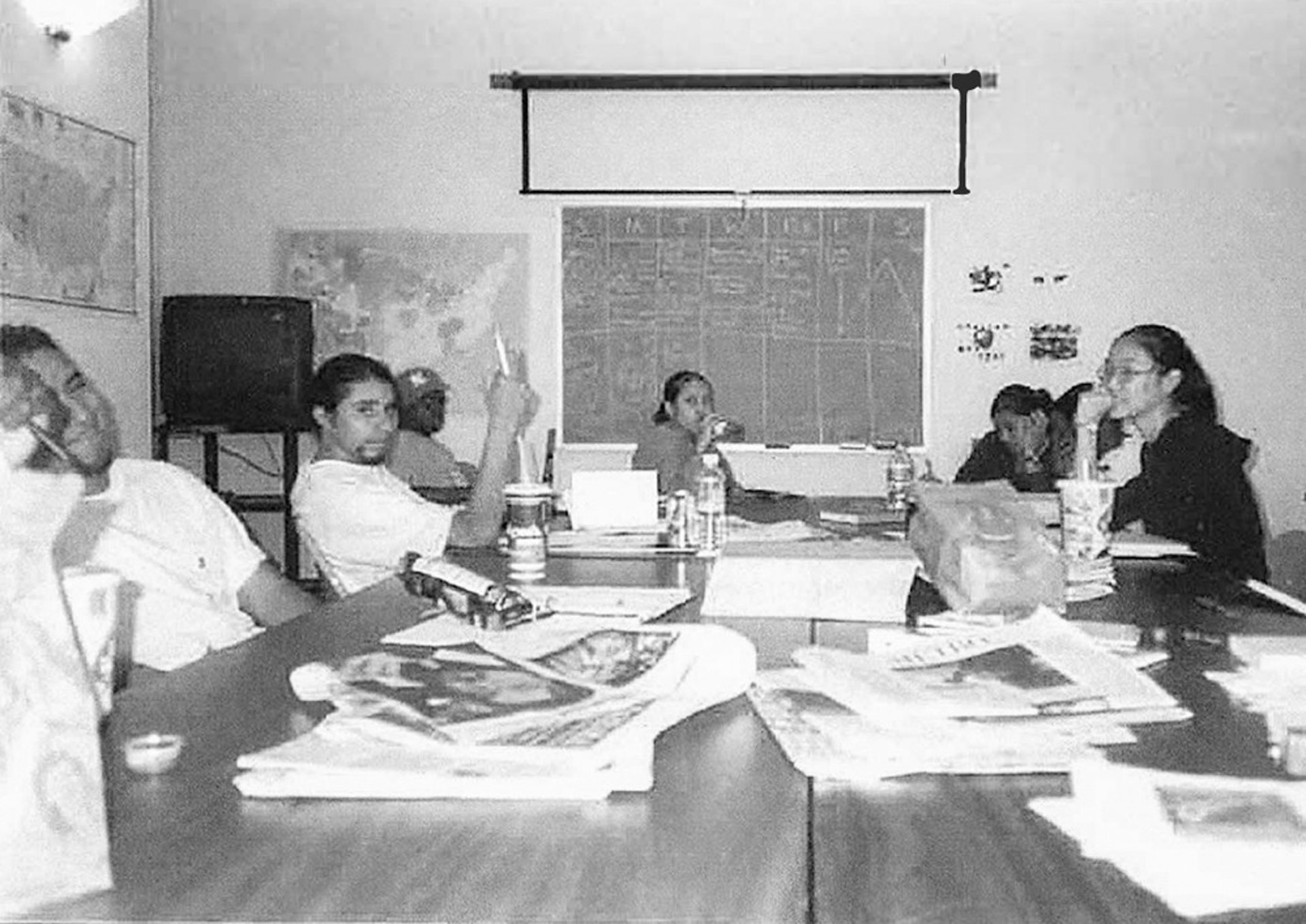 an abstract photo of a curved building with a blue sky in the background