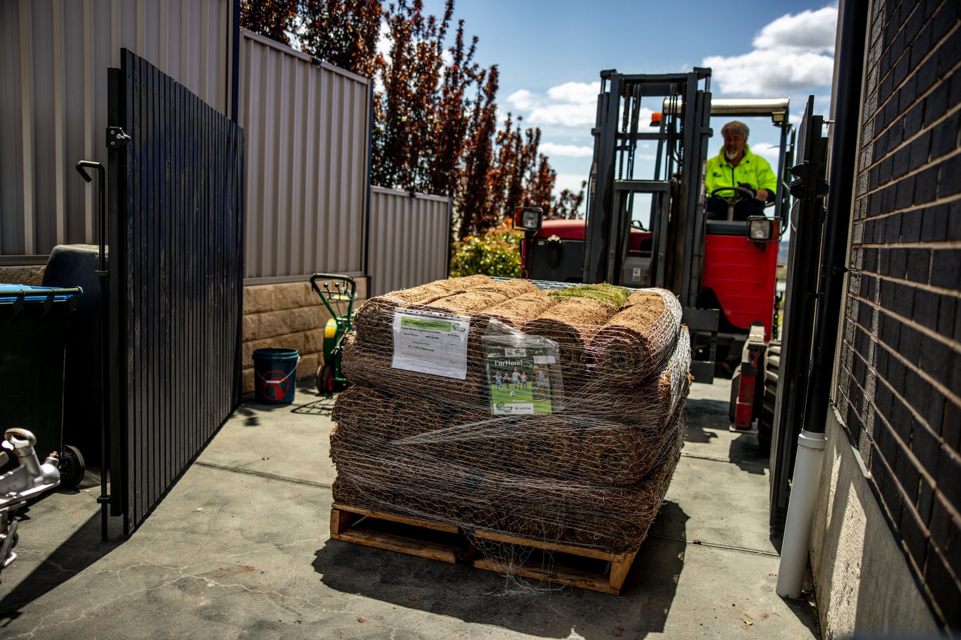 black and brown leather padded tub sofa