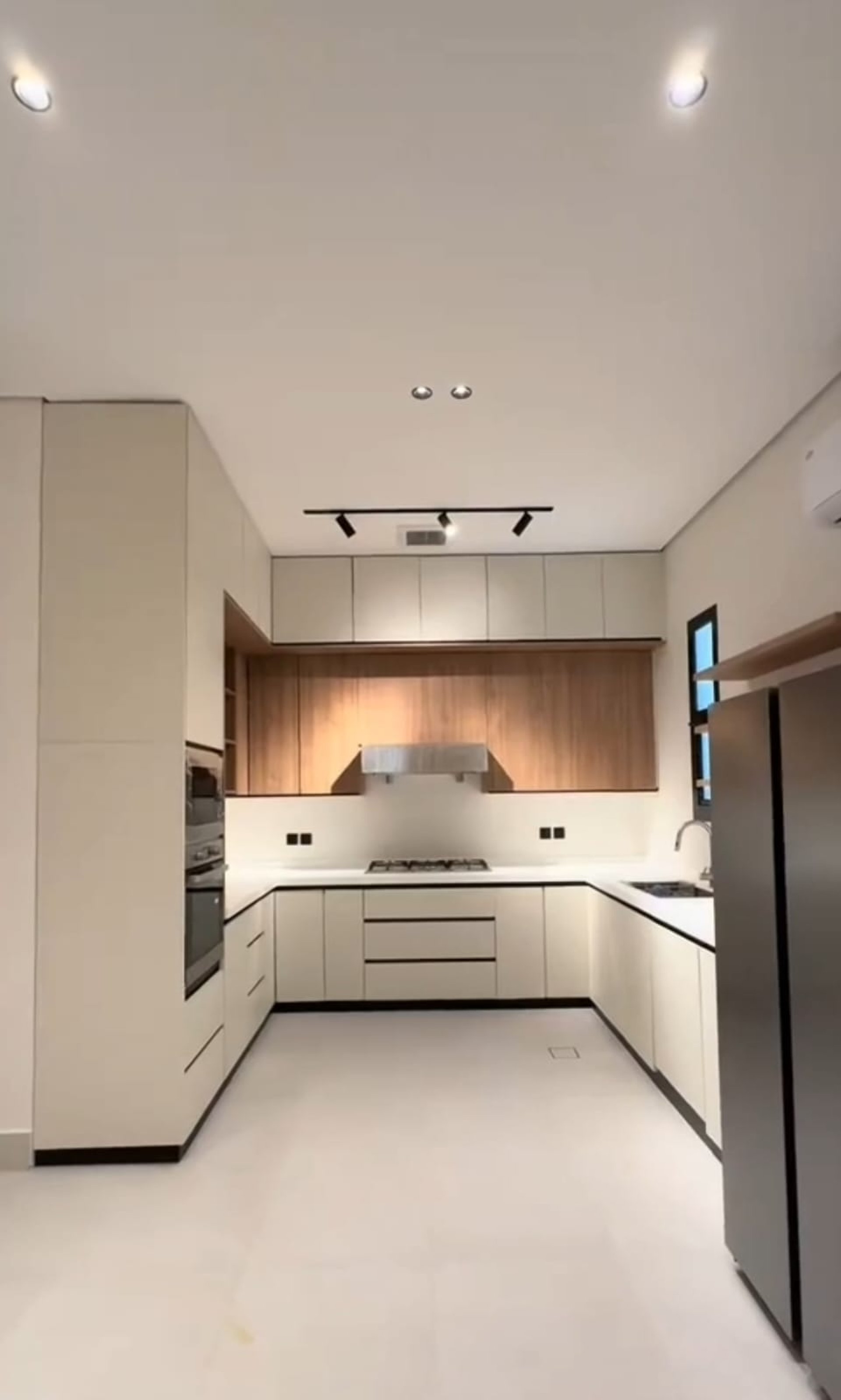 woman wearing yellow long-sleeved dress under white clouds and blue sky during daytime