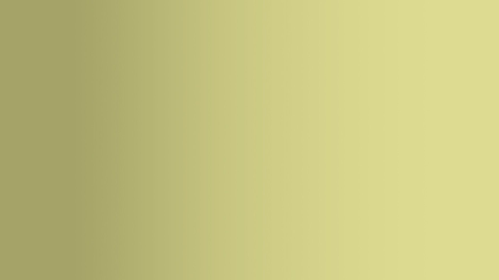 crowd facing lighted stage