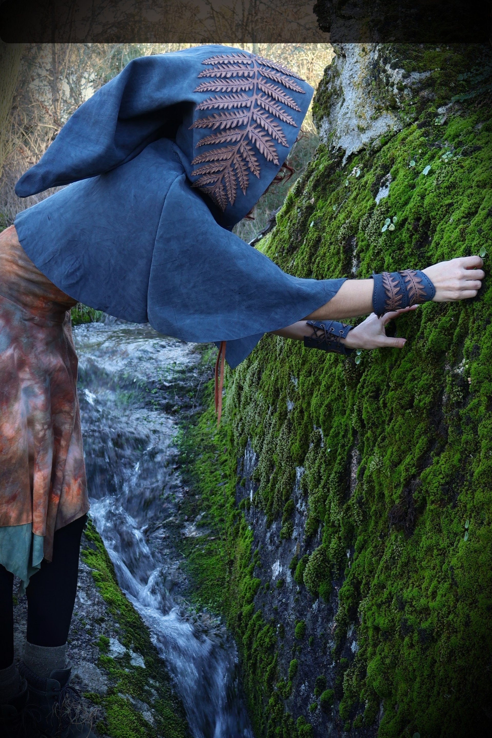 person wearing grey knit sweater