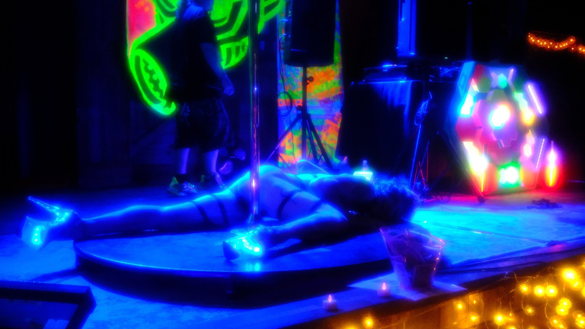 an abstract photo of a curved building with a blue sky in the background
