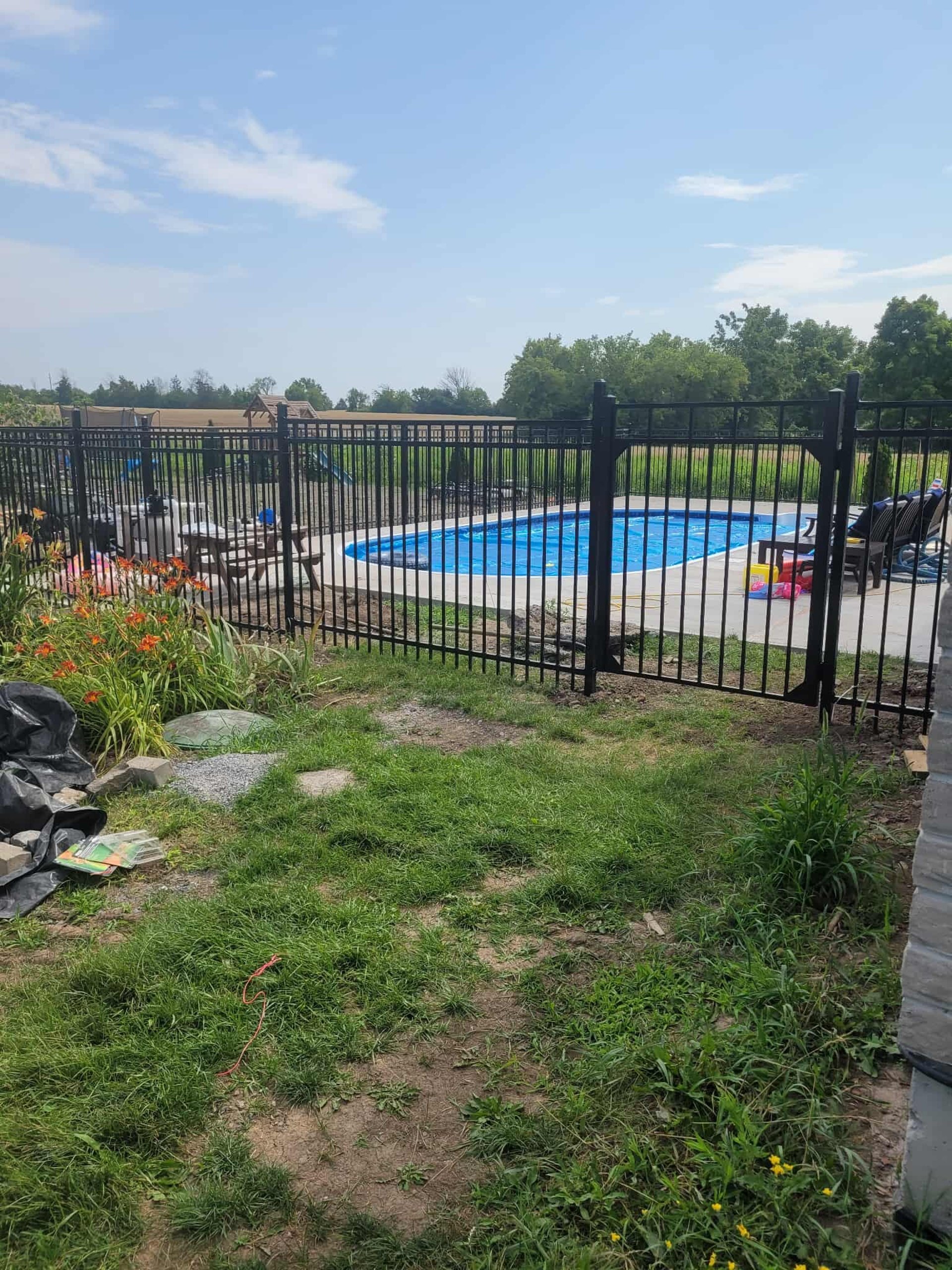 an abstract photo of a curved building with a blue sky in the background