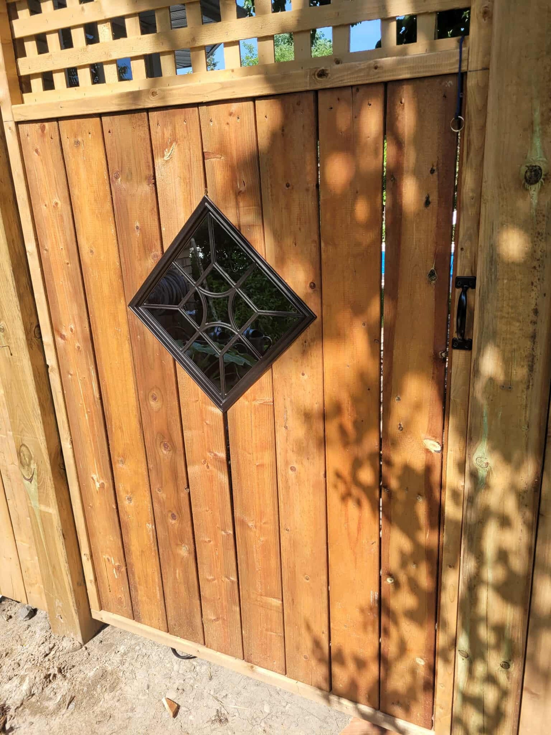 an abstract photo of a curved building with a blue sky in the background