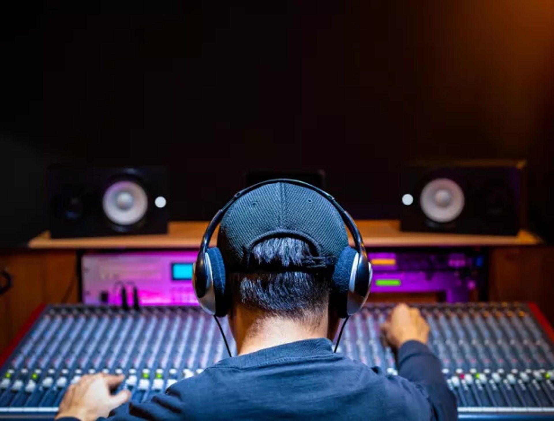 black and brown leather padded tub sofa