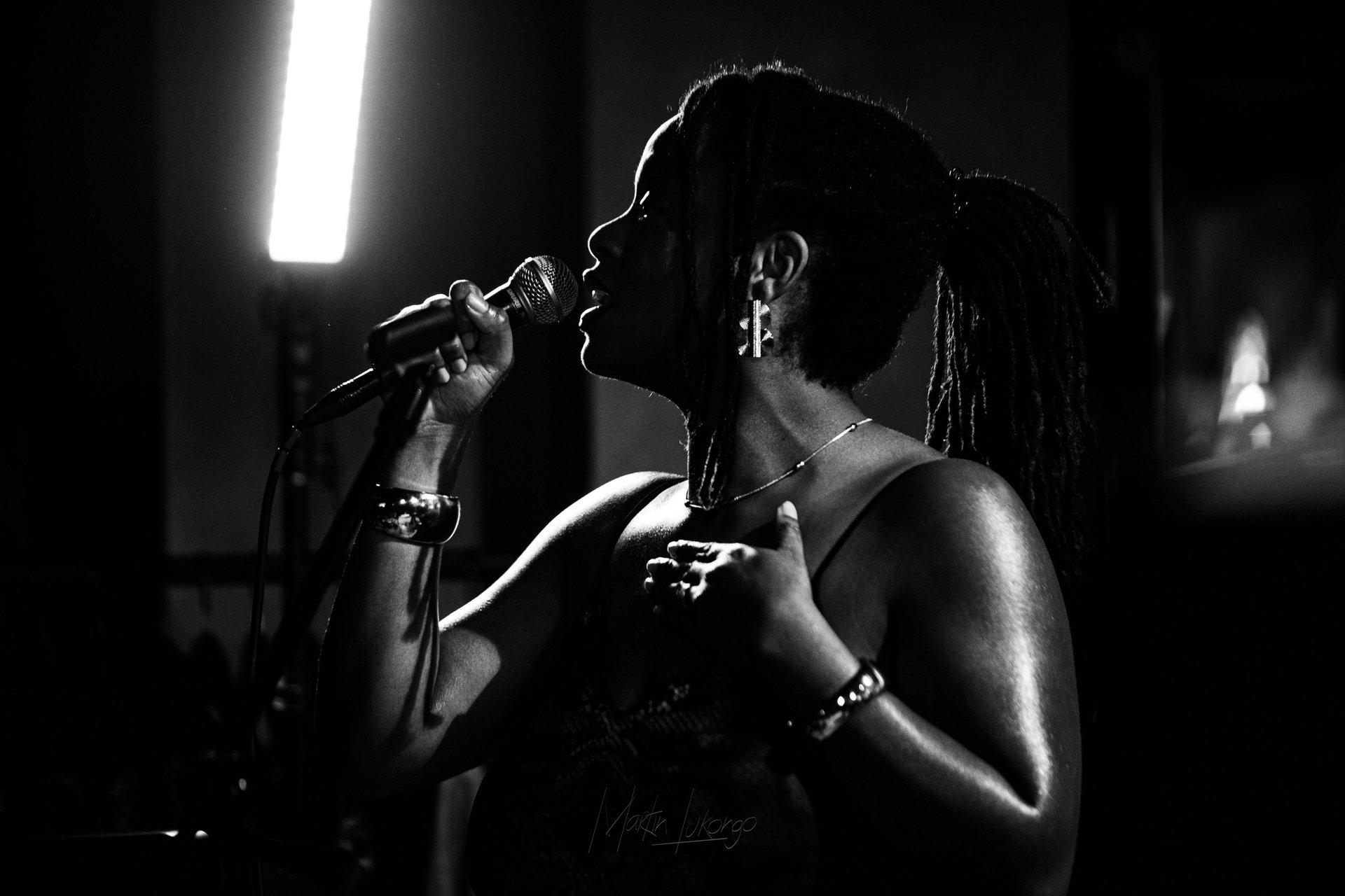 a close up of a black and brown abstract painting