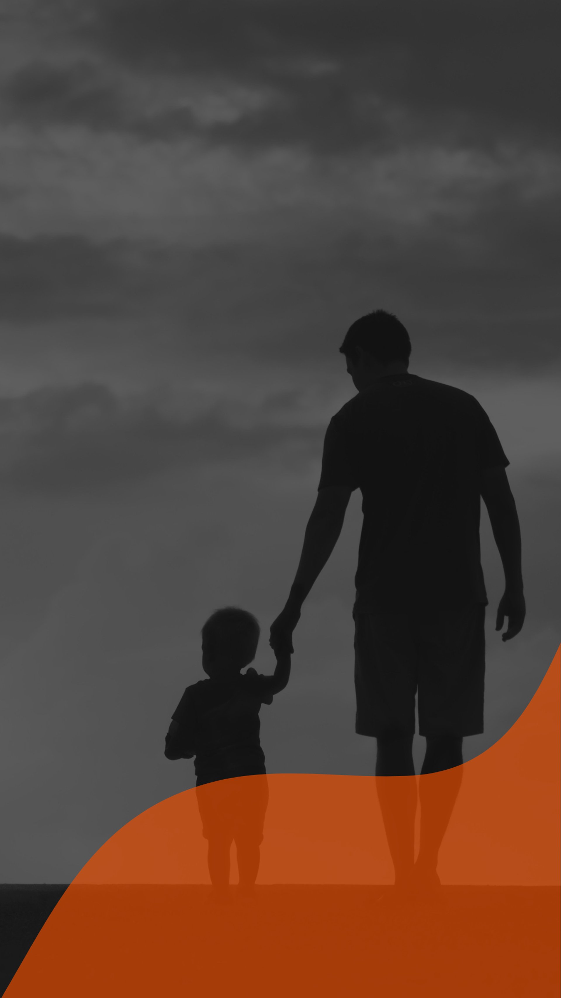 man holding girl heading towards sea