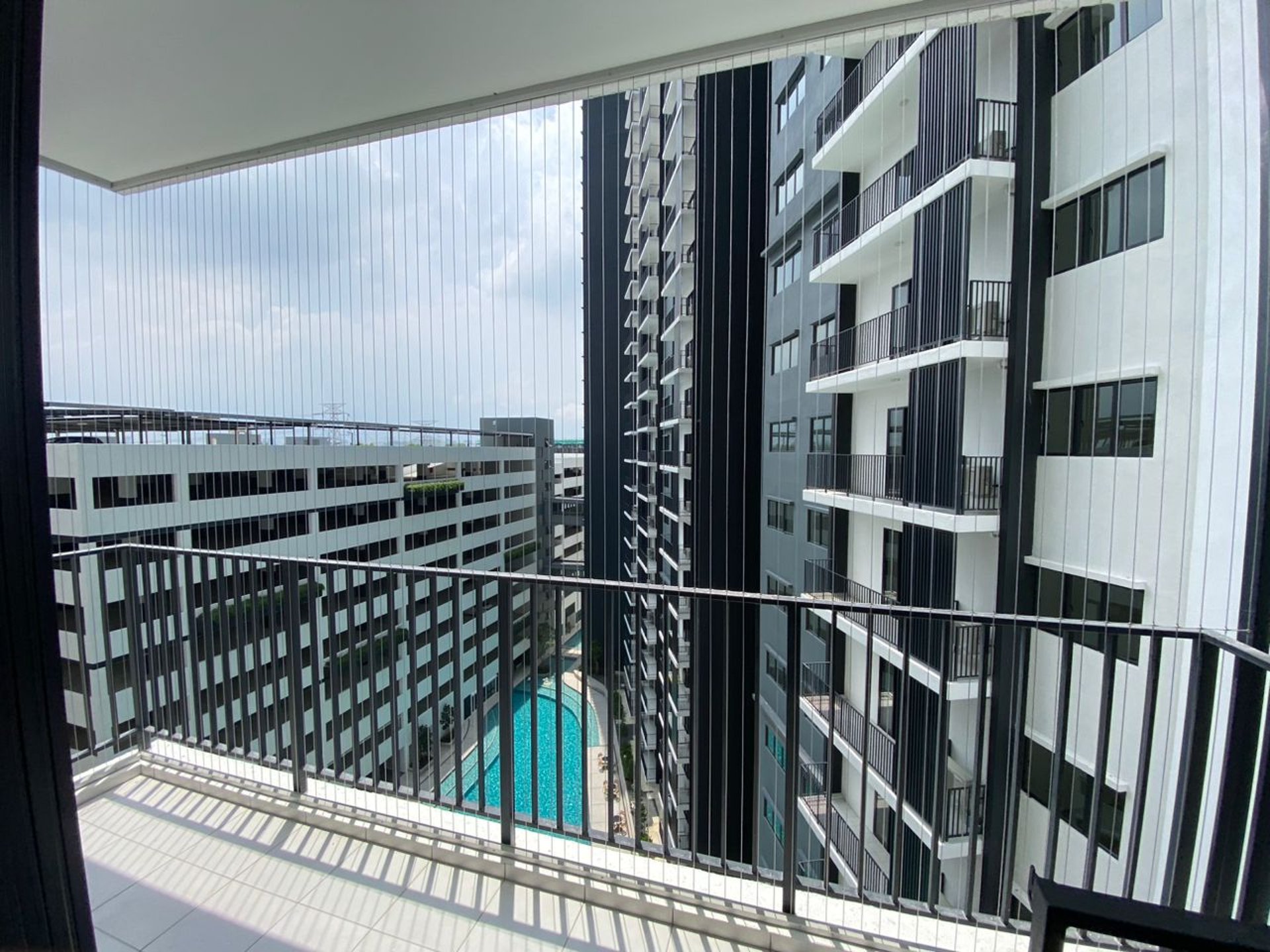 woman wearing yellow long-sleeved dress under white clouds and blue sky during daytime