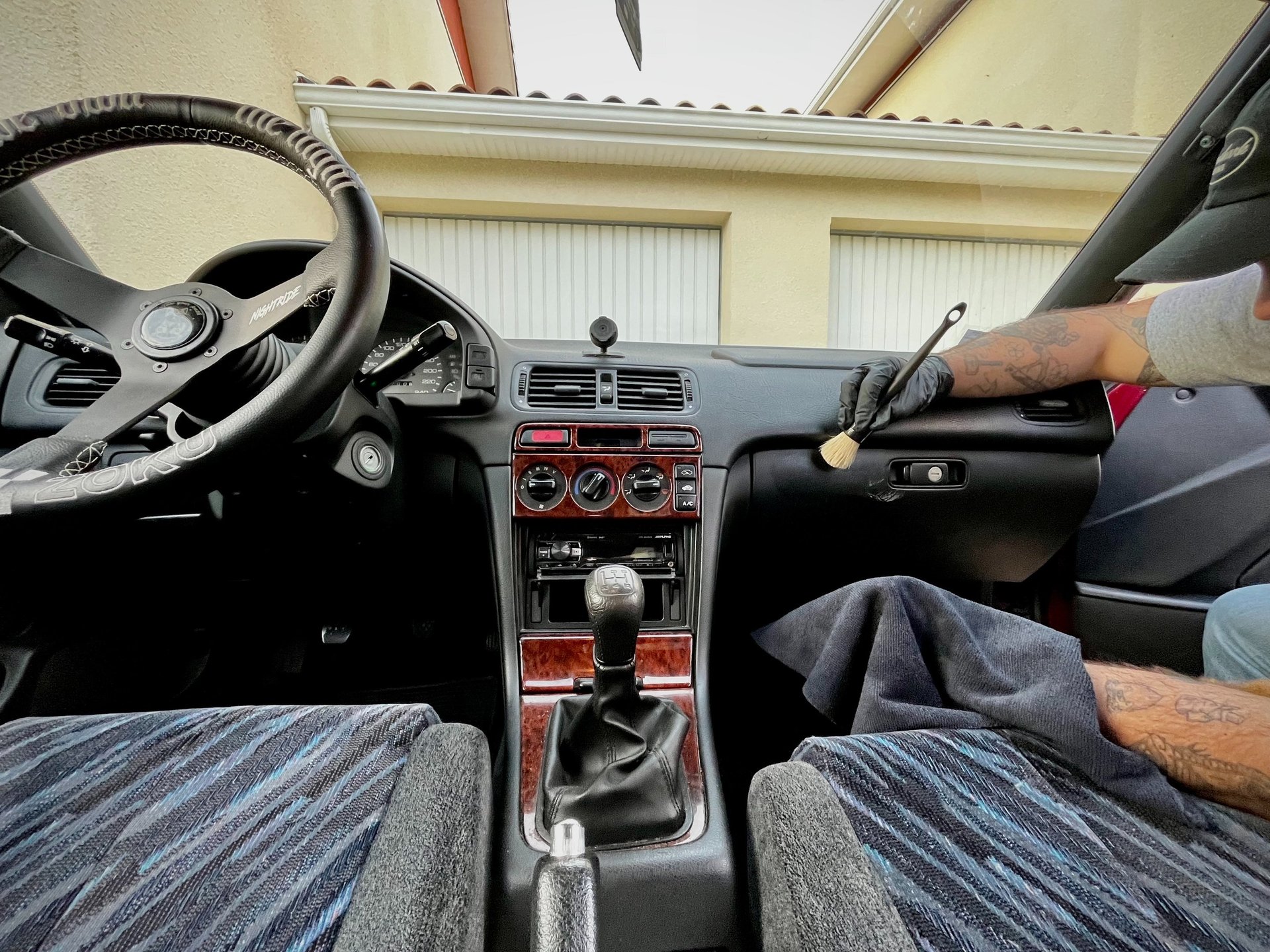 black and brown leather padded tub sofa