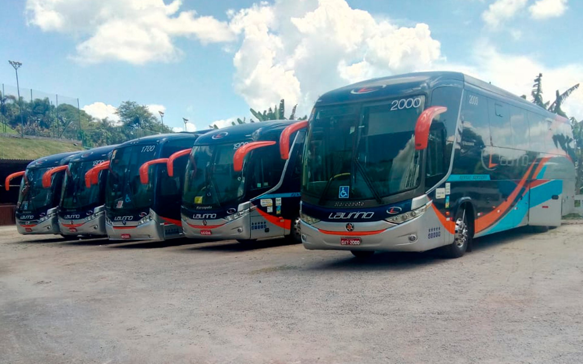 an abstract photo of a curved building with a blue sky in the background