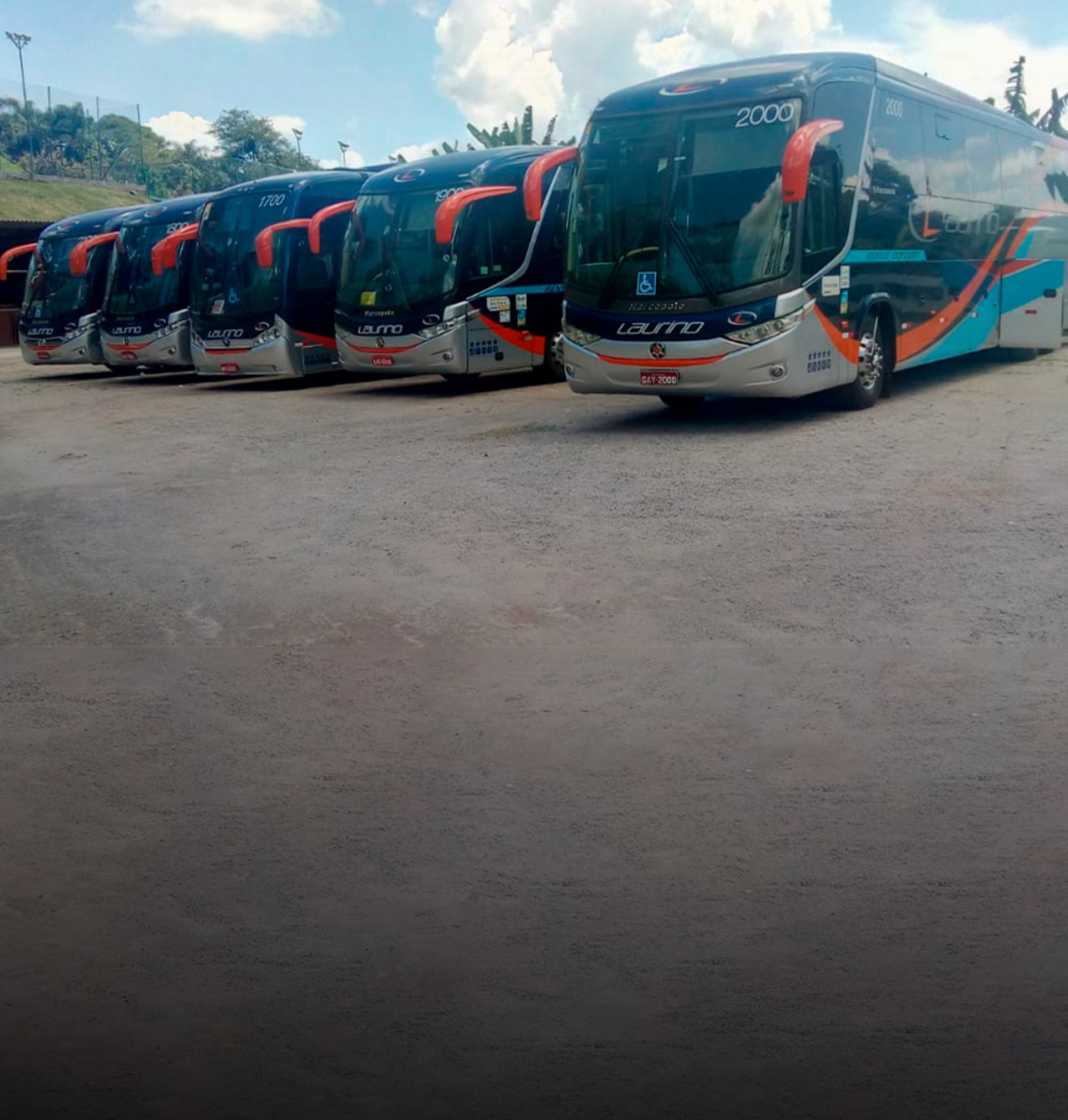 an abstract photo of a curved building with a blue sky in the background